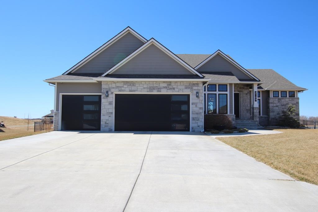 This home has it ALL. Located on the 14th tee at Sand Creek Station golf course. Features 5 bedrooms