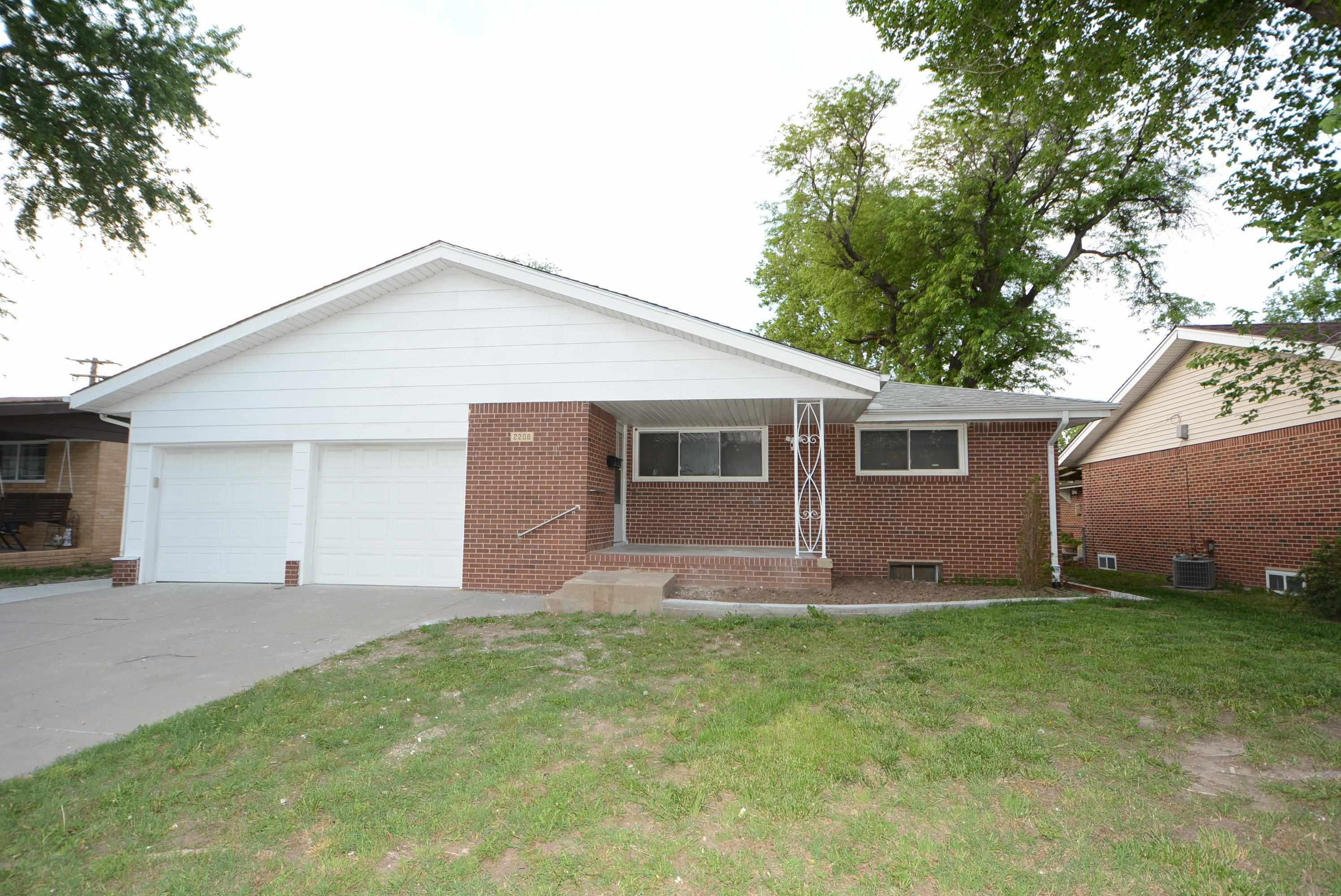 Nice full brick ranch! totally remodeled, newer windows, huge basement with family room, two extra r