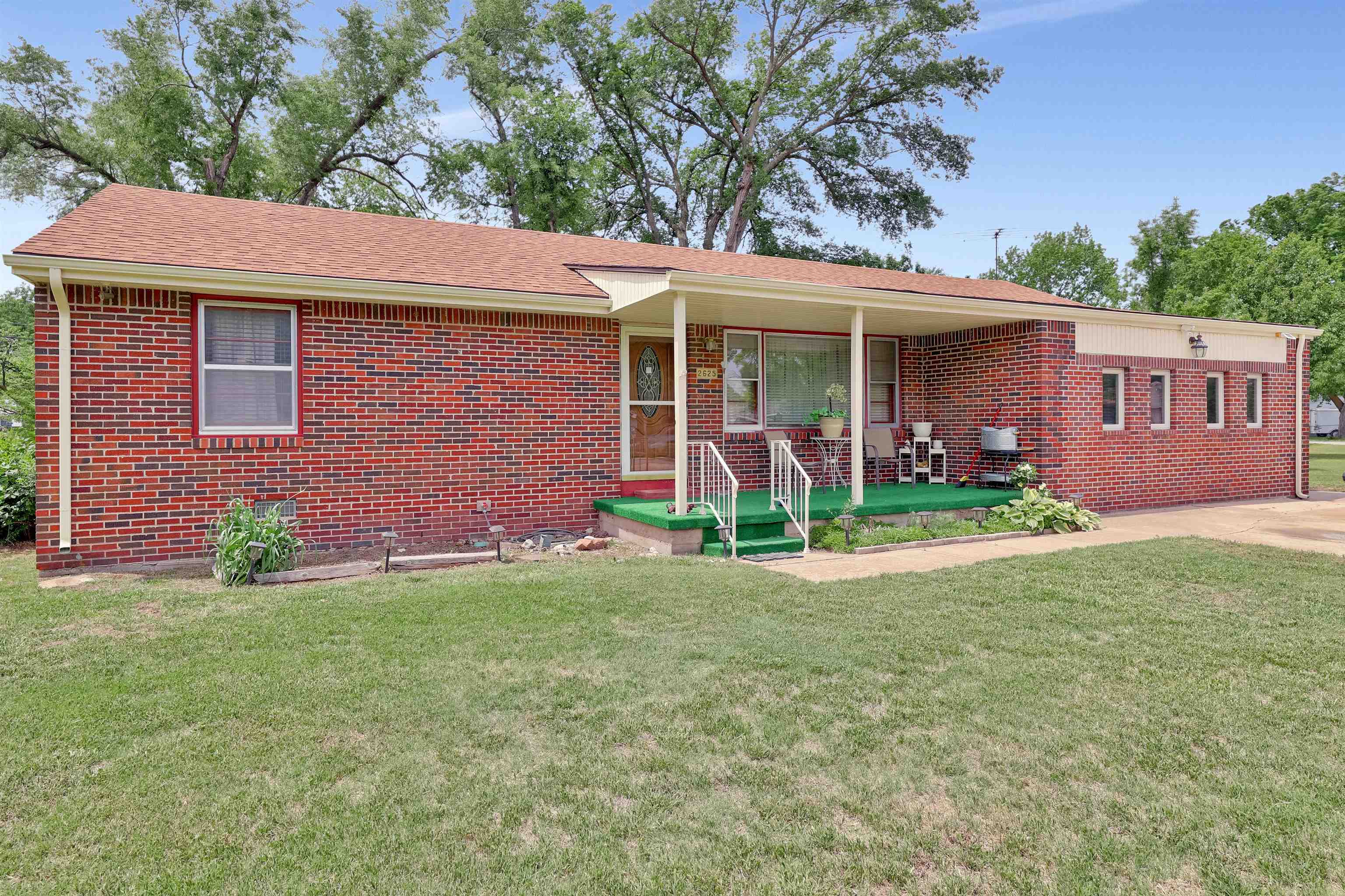 Well cared for, all brick home, sitting on over half an acre! You will love the quiet neighborhood a
