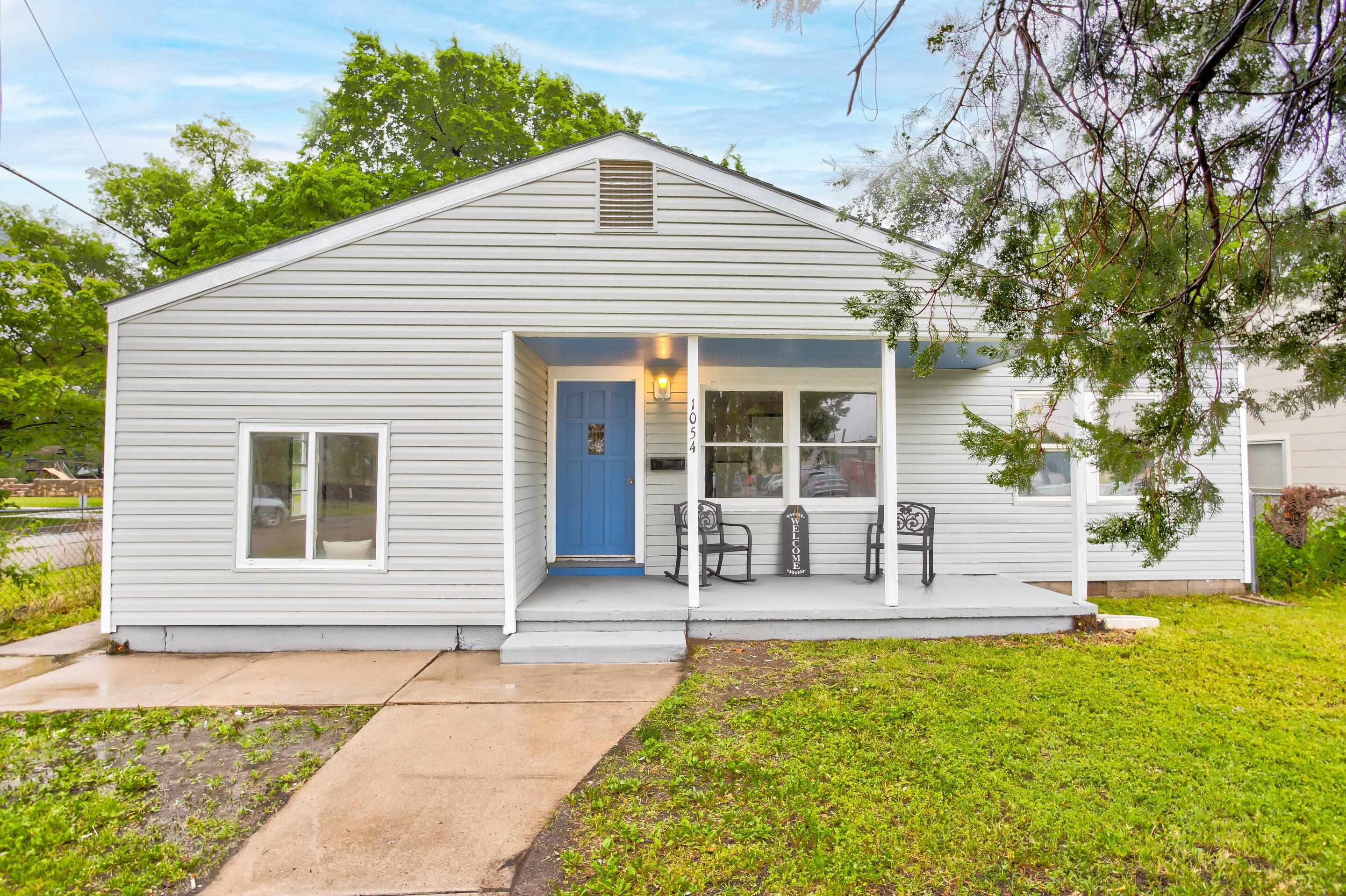 Newly remodeled four bed, two bath cutie of a home! Sprawled across a corner lot, this home has new 