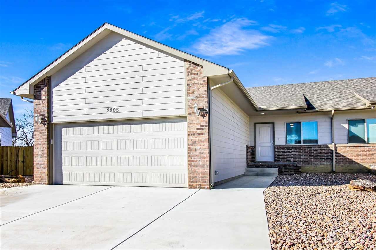 Welcome home to this beautiful 4 bed, 3 bath home in Kechi KS! This spacious home was built in 2018 