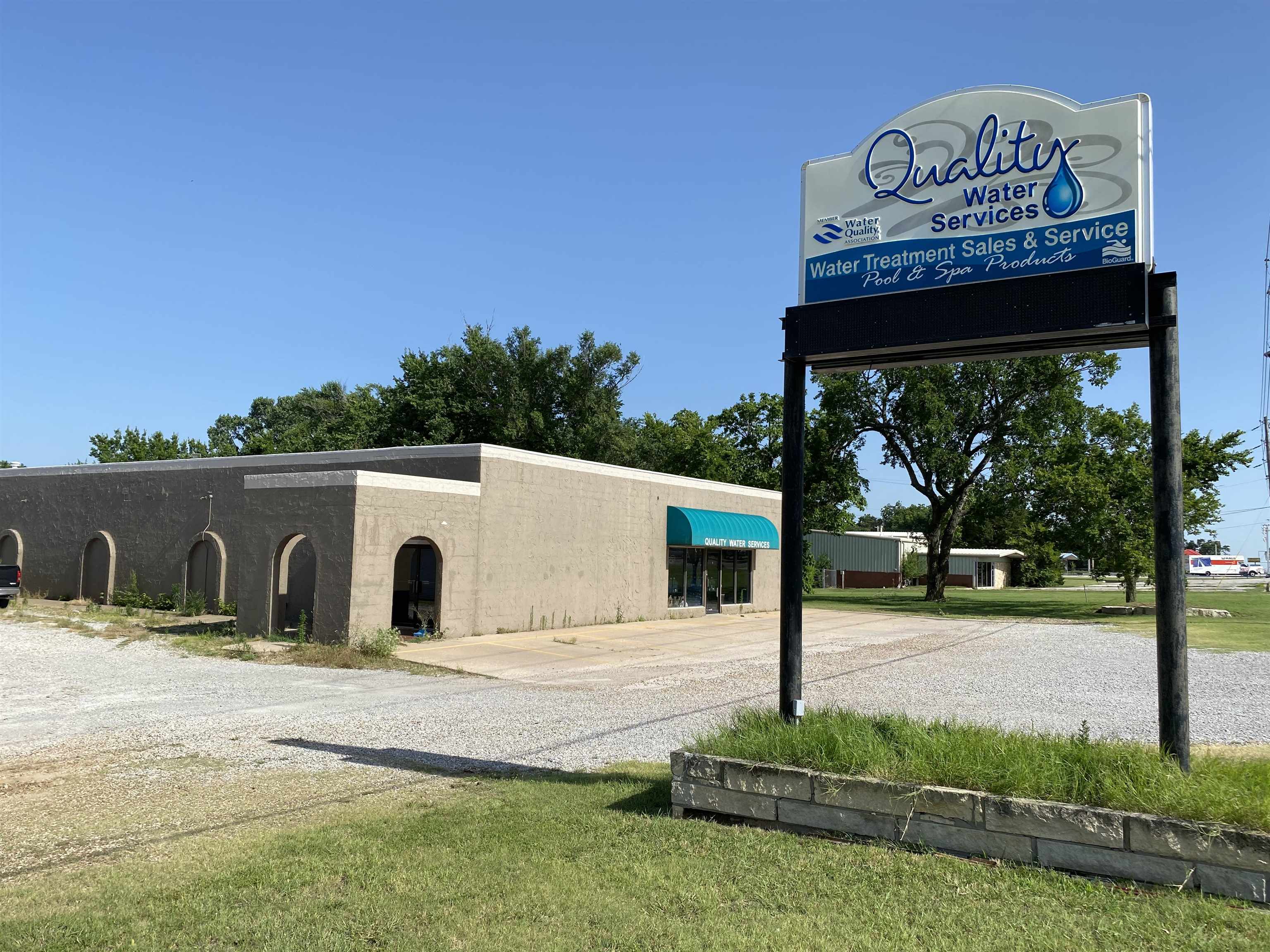 Great commercial space along Arkansas City's primary retail corridor. This stand alone building offers everything you need for just about any business format. Office space, showroom, warehouse space with overhead door, and customer service counter are all here.  Connecting vacant lot is also for sale. Special pricing available if purchased together.