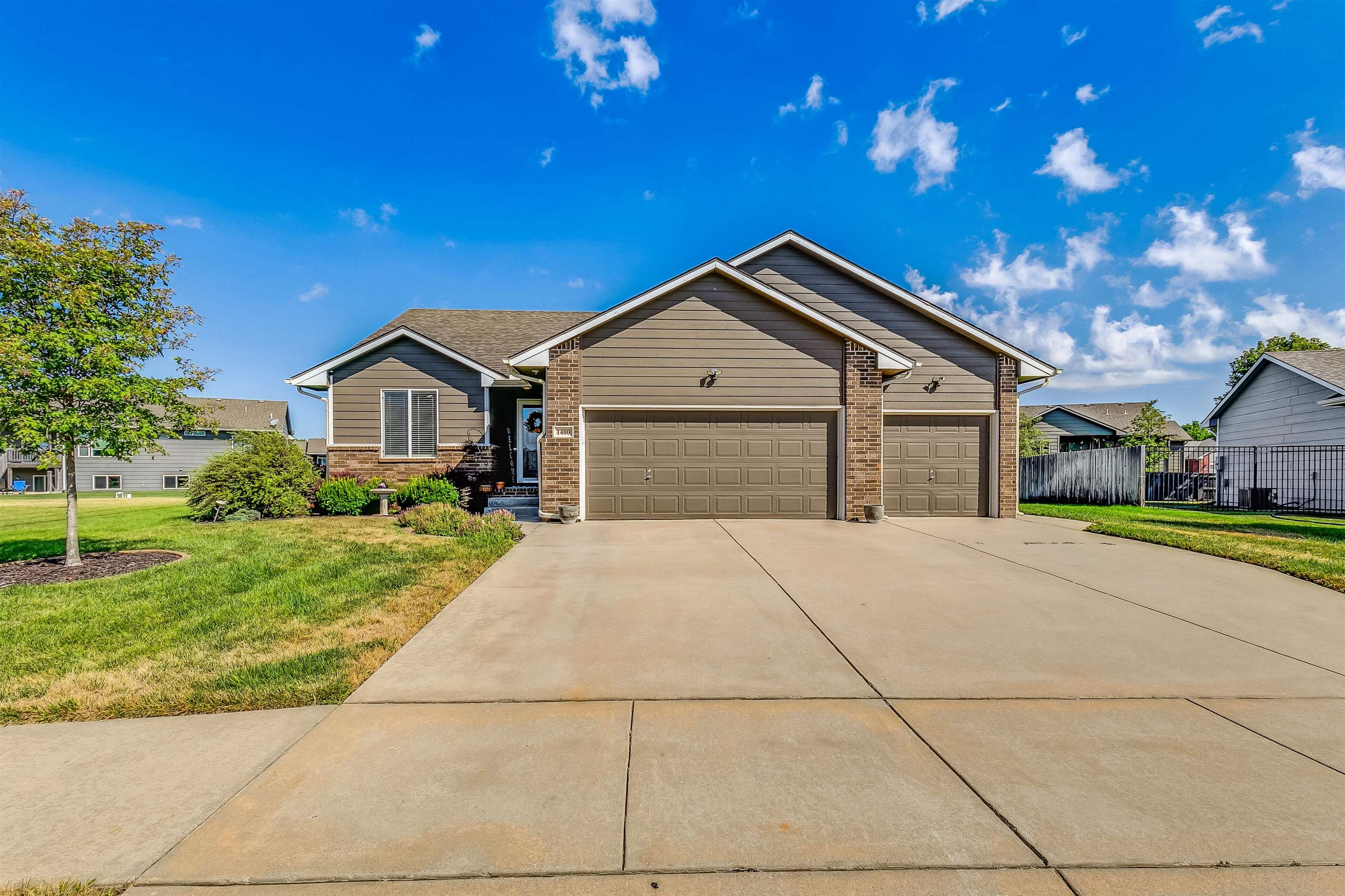Welcome to this cute ranch style home. When you walk in, you are greeted with vaulted ceilings and a
