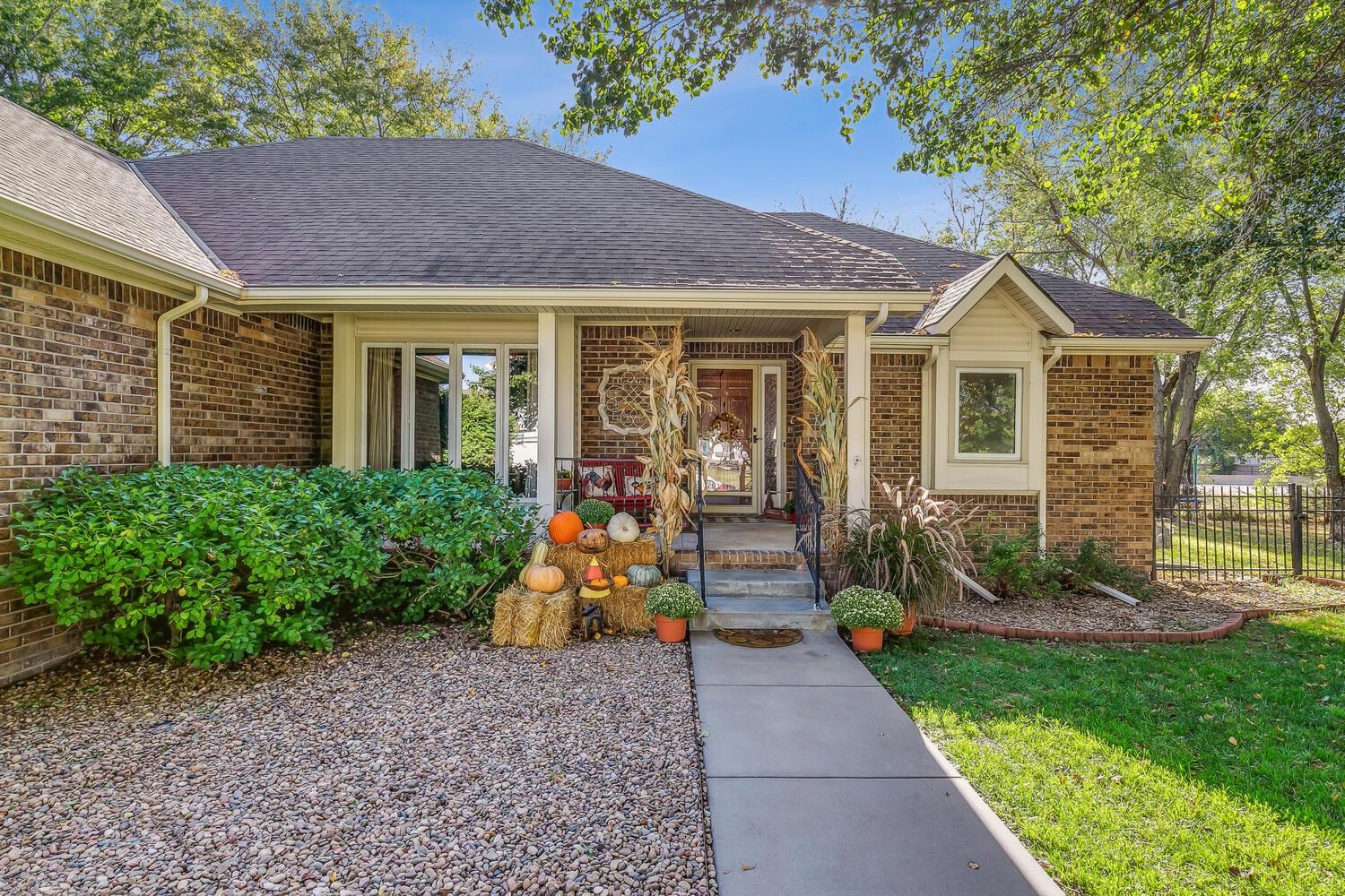 Welcome to this stunning home situated in one of the most desirable neighborhoods in East Wichita. T