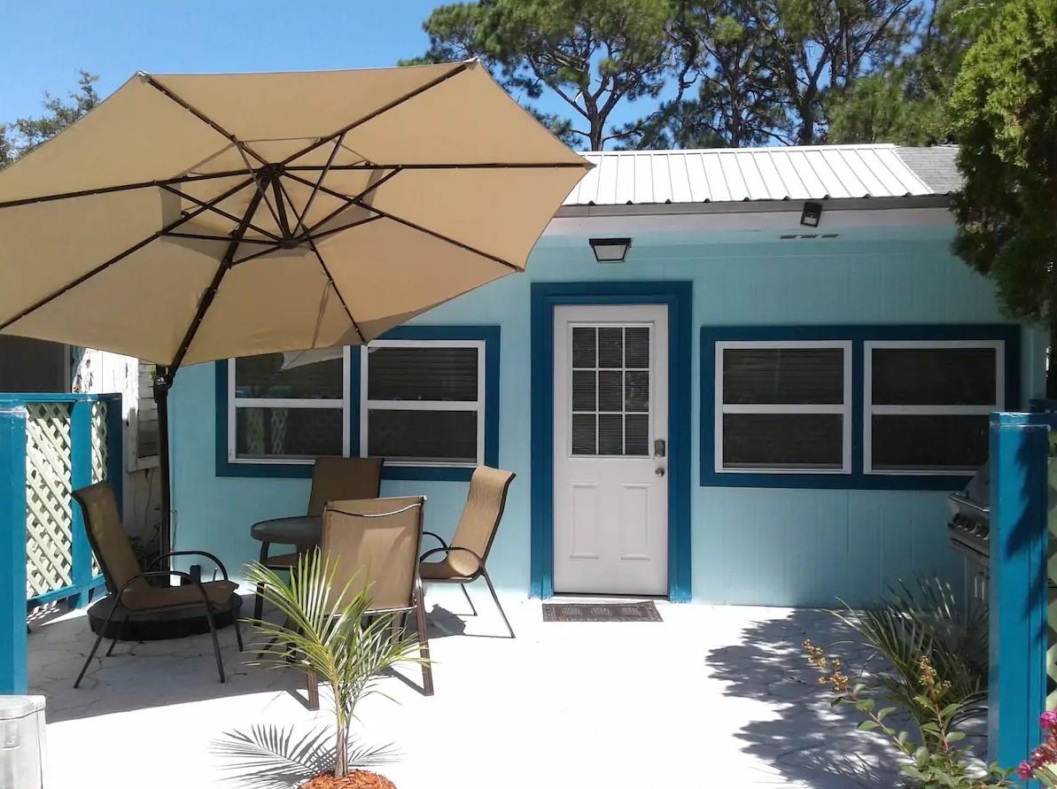 WAIT - WHAT? A Florida style cottage for only $175,000? This 2 bedroom, 2 full bath converted Army barrack has over 900sf of renovated & well laid out living space. 2015 metal roof, Central HVAC, updated electrical & plumbing are among a long list of updates & renovations. There are tile floors throughout the unit & the back porch area has been converted to accommodate a stackable washer/dryer. This unit has been used as an AirBnB with over $1,000 per month rental income for 2021. With the coastal decor and within 1/2 mile of the water, this unit is perfect for those long weekend getaways or continue to use as a vacation rental. Carrabelle &SGI white sandy beaches are less than 30 minutes away. Come and enjoy the quaintness of the Forgotten Coast. Measurements are approximate & should be verified if important