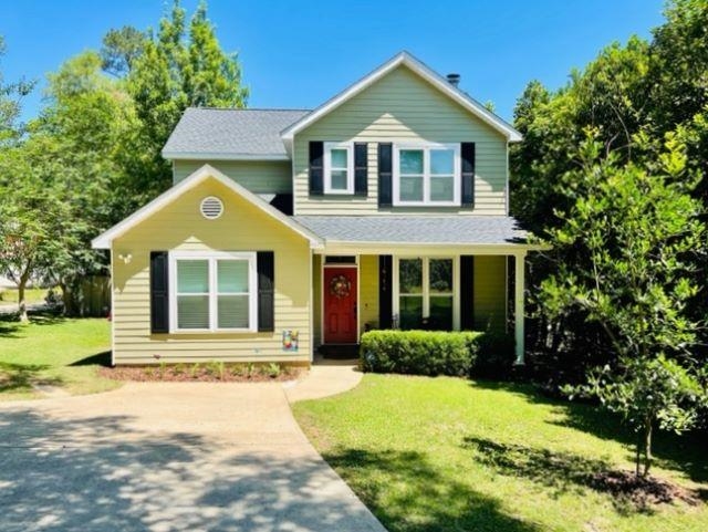 WOW! This one is sooooo cool and that Killearn area location can NOT be beat! Super cute two story 4/2.5 on a GREAT LOT on the Northside of town. SO convenient to everything! How cool is that black and white tile in the kitchen and baths! NEW WATER HEATER 2022! NEW ROOF 2020 and NEWER WINDOWS 2018. Garage was professionally enclosed to make 4th bedroom WITH closet or use as another living room or office. WOOD FLOORS throughout and CROWN MOLDING everywhere. Upstairs master has walk in closet. HUGE part of this AWESOME LOT to the right of home is the PERFECT recreational area for the kiddos to play. Fenced back yard directly behind the home is the perfect relaxing little outdoor space for the parents to hang out while the kids play in the adjacent yard beside the home. This super unique and fun little Killearn area gem will definitely NOT last long at this price - CHECK OUT THAT GREAT LOW PRICE PER SQ. FT. - for the Killearn area and come check it out as soon as you can!