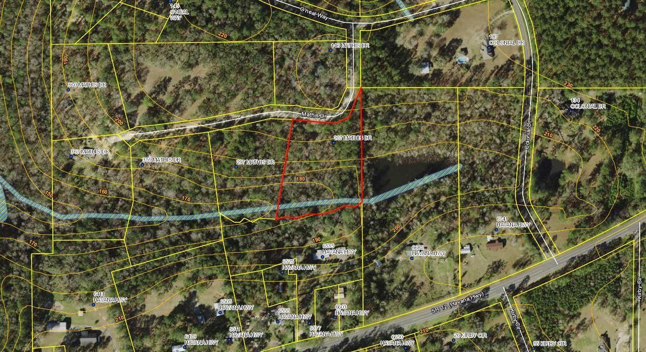 Almost 3 acres in quiet Havana just right outside Tallahassee. Come build your dream home. Land is at a slope so home site would need to be at the top of the property.
