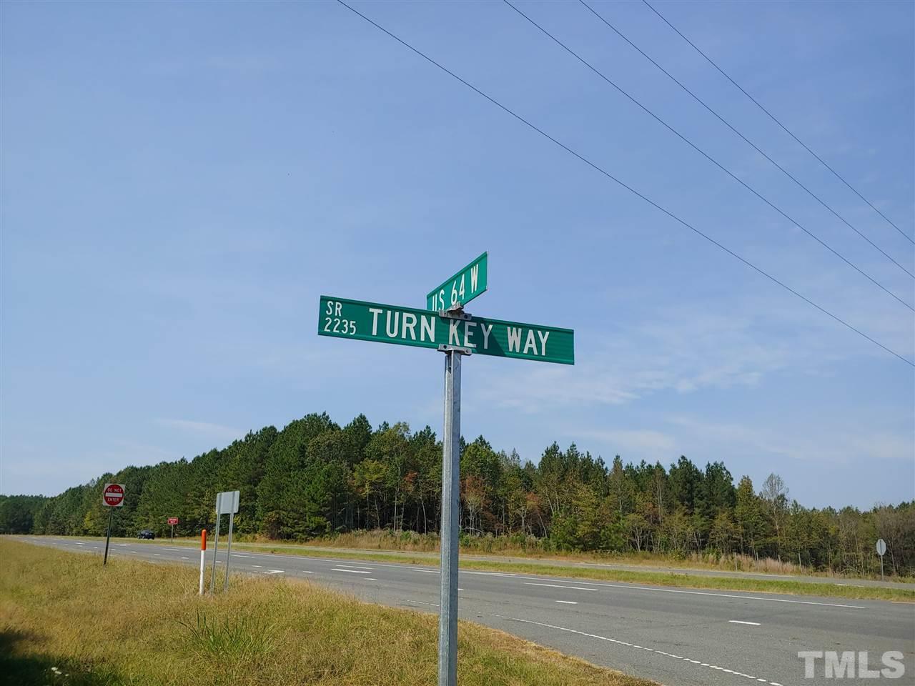 Intersection of US 64 West and Turn Key Way (Gravel Rd)