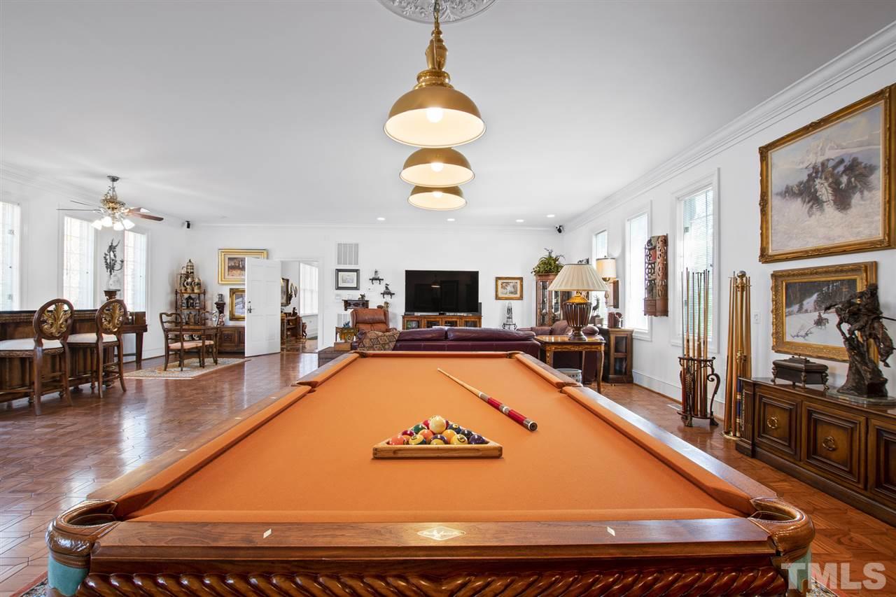 Incredible family entertaining space, large enough for pool table, bar, tv area, and various game tables.