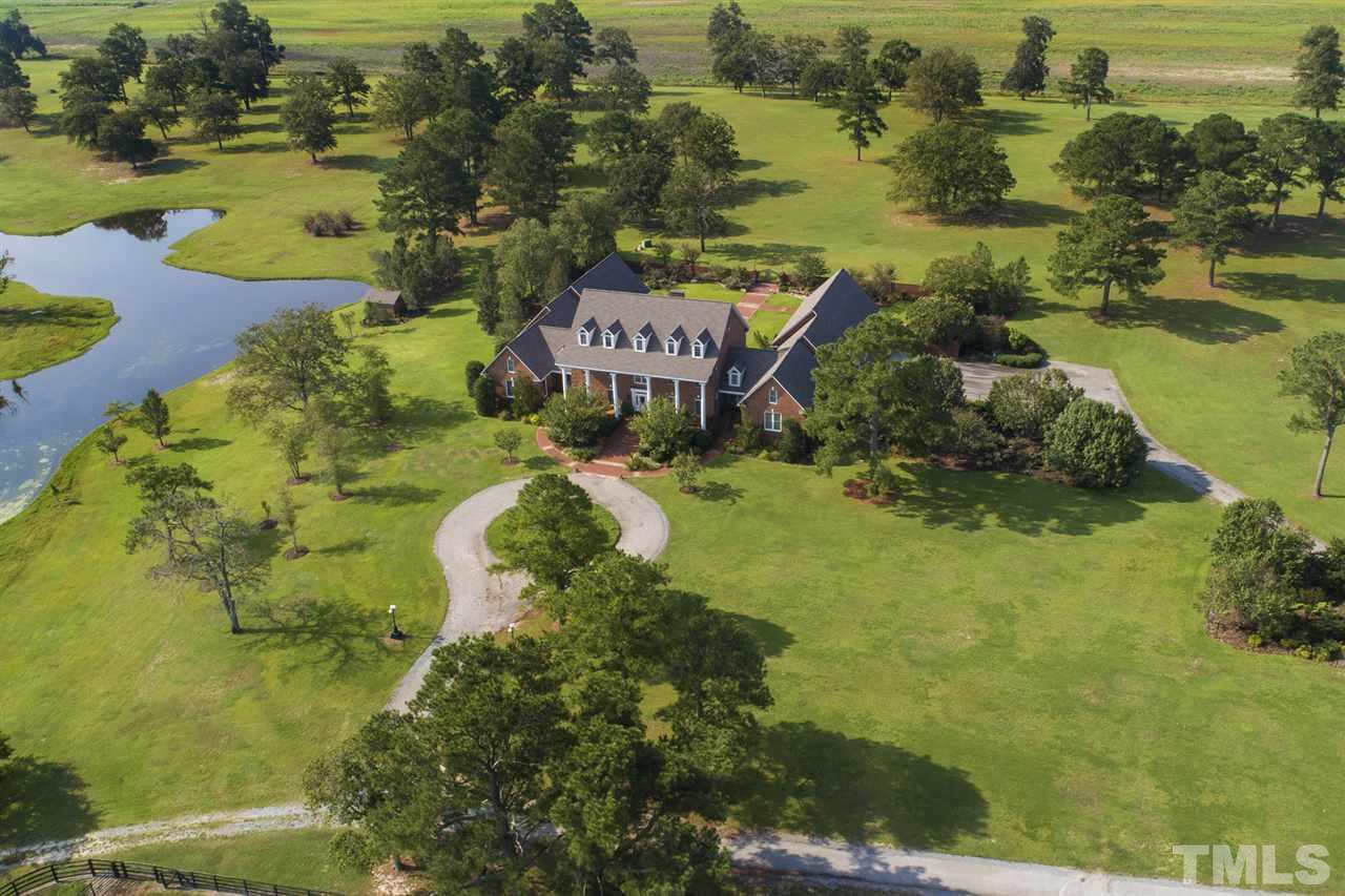 Approximately 350 picturesque acres with 10 ponds created by well-known professional designer.
