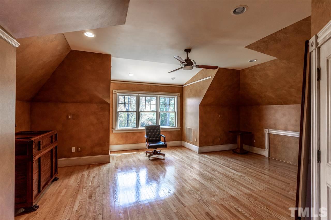 This large space makes an amazing office that connects to the spiral staircase.  Clients and staff can use that staircase so that the family home will not be disturbed.