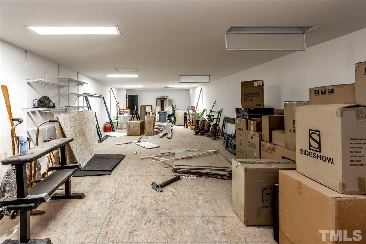 This level of garage is about 1400 square feet and could make a great office or apartment.  The owner currently uses it as his carpentry area and storage area