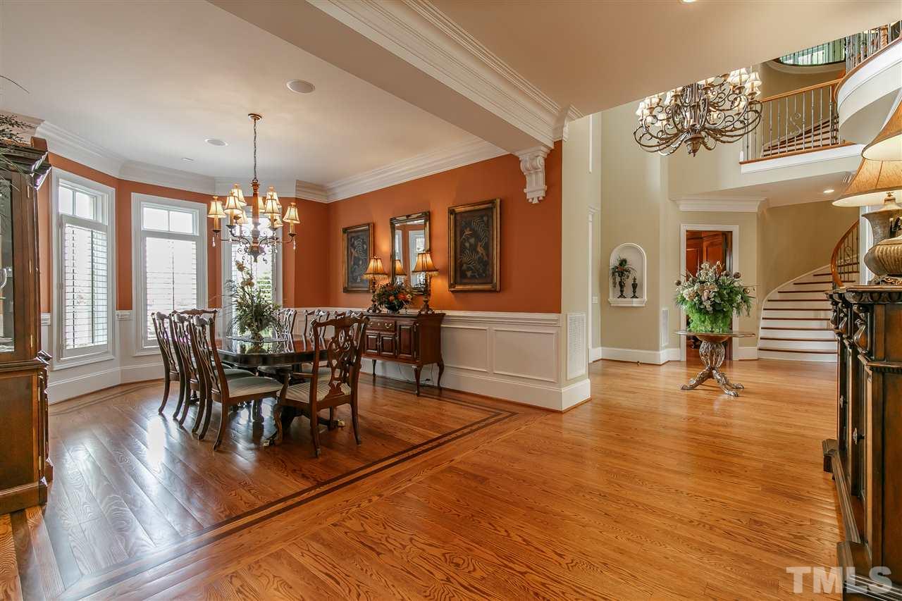 NO detail overlooked: wainscoting, HEAVY decorative moldings, security system, audio system, central vac...