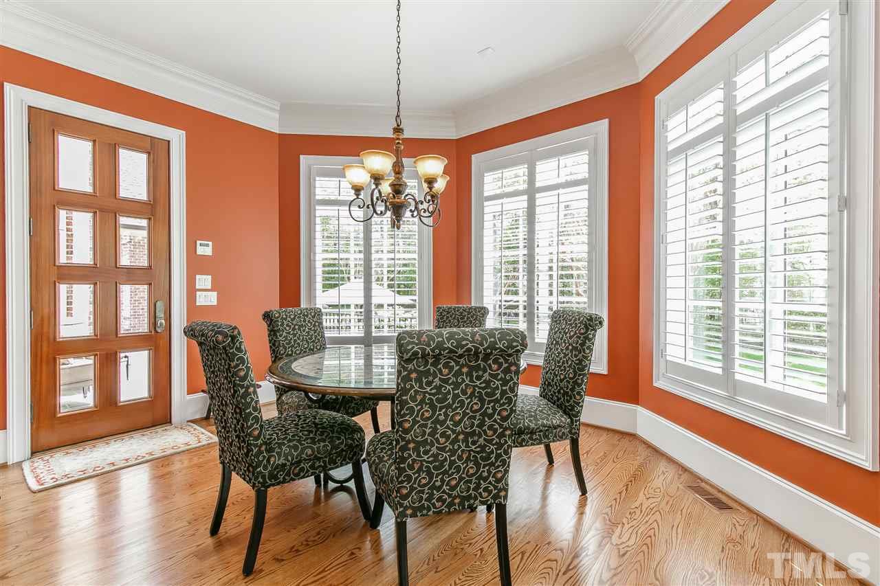 Bright windows and plantation shutters in breakfast area