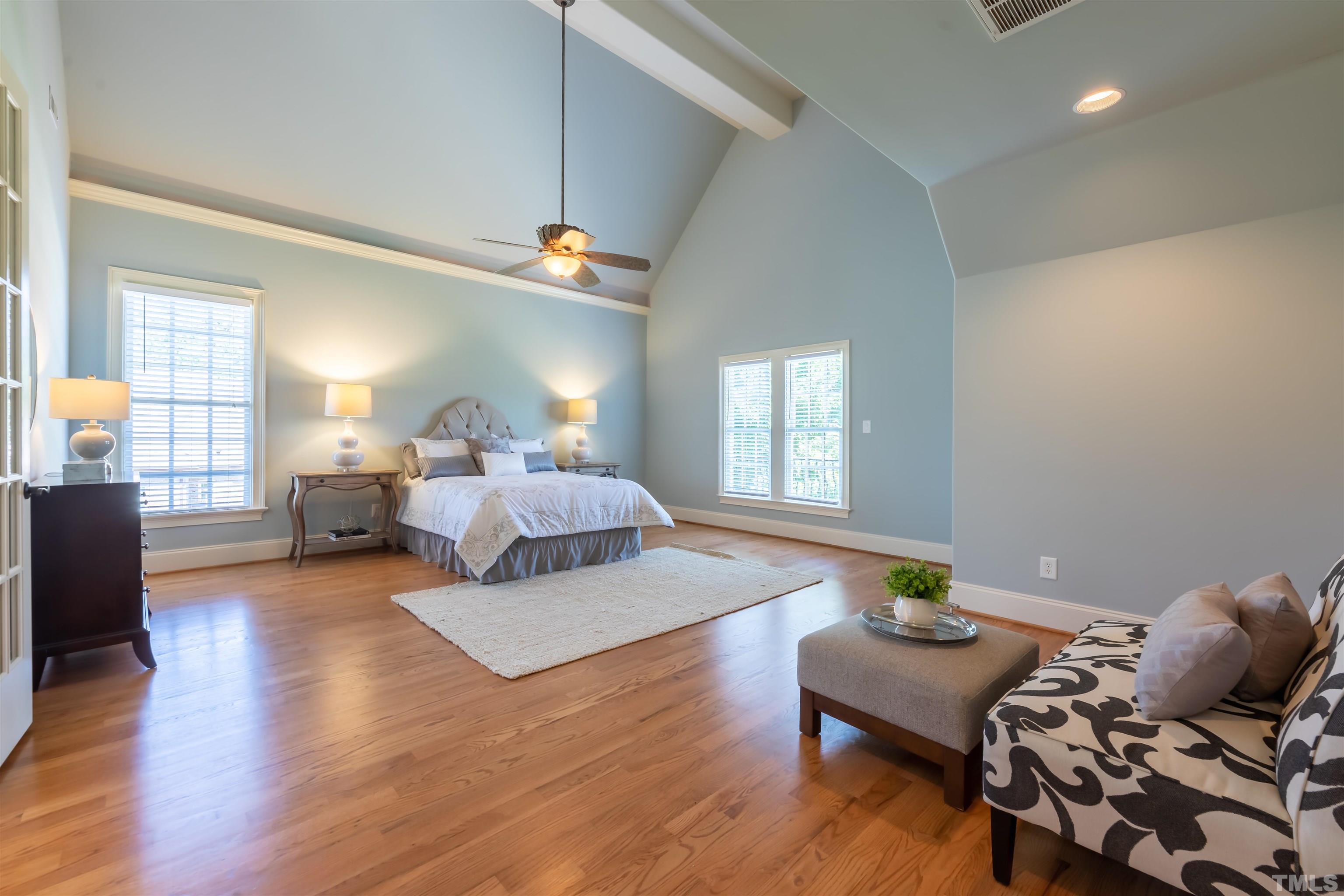 The second floor master bedroom is huge with vaulted a vaulted ceiling.  There are hardwoods in the bedroom and also in the hallway and loft.   The master sits at one end of the 2nd floor for some privacy.