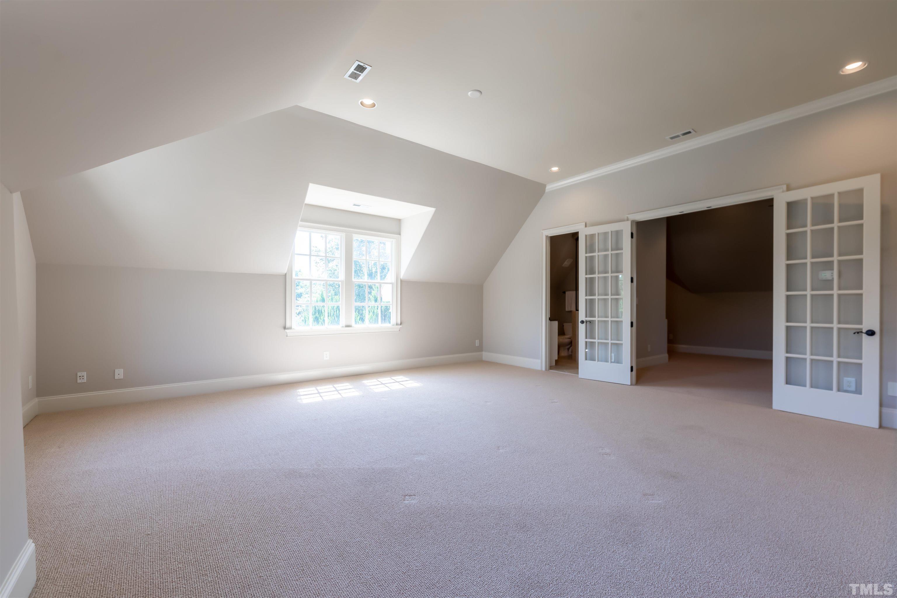 The second floor bonus has hall access as well as back stair access.  There is a flex room off the bonus that can be a second office/exercise room/toy room.  Not pictured is the finished third floor with so much space & a full bath plus access to storage.