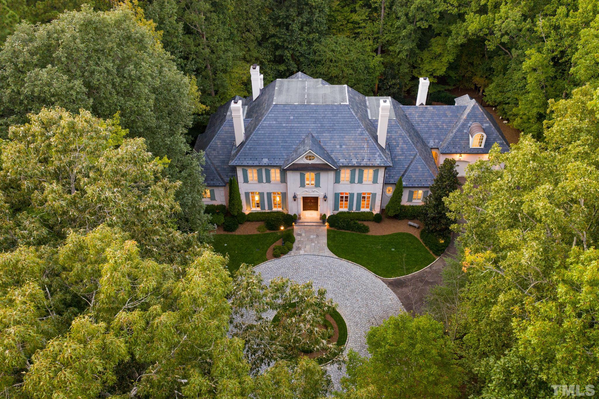 Ultimate seclusion nestled on 2+ac backing to Falls lake preserve land (nothing can be built) w/Gated entry; Barely lived in, Rufty Custom Built w/no detail overlooked; Craftsmanship that???s almost impossible to replicate (cost $7.5M+ to build today)