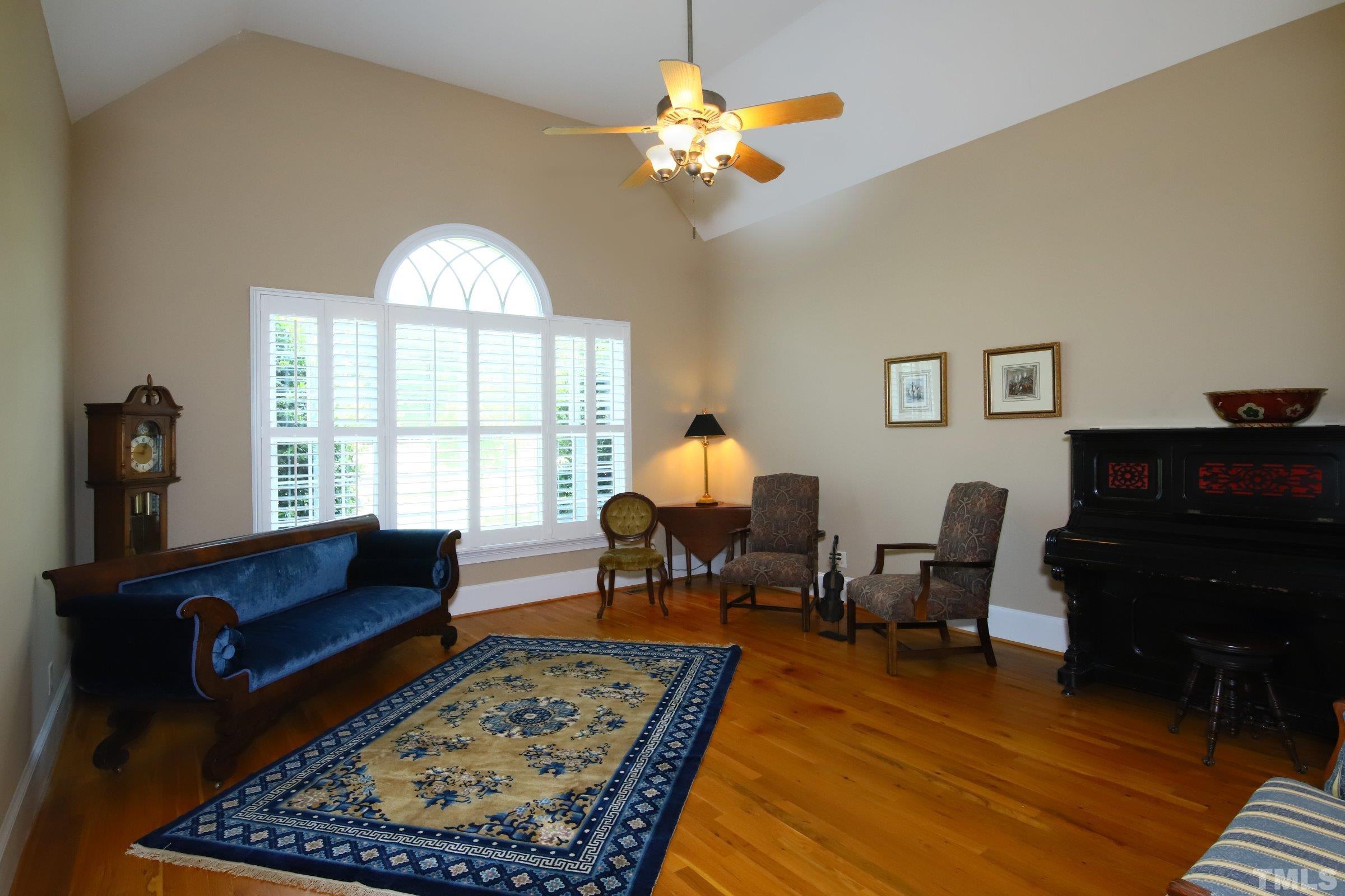 Lovely and large, the parlor is perfectly situated in the residence with soaring cathedral ceiling. It is private yet not isolated offering easy access to rest of the house. Ideally suited for in-home office, music room, conversations or many other uses.