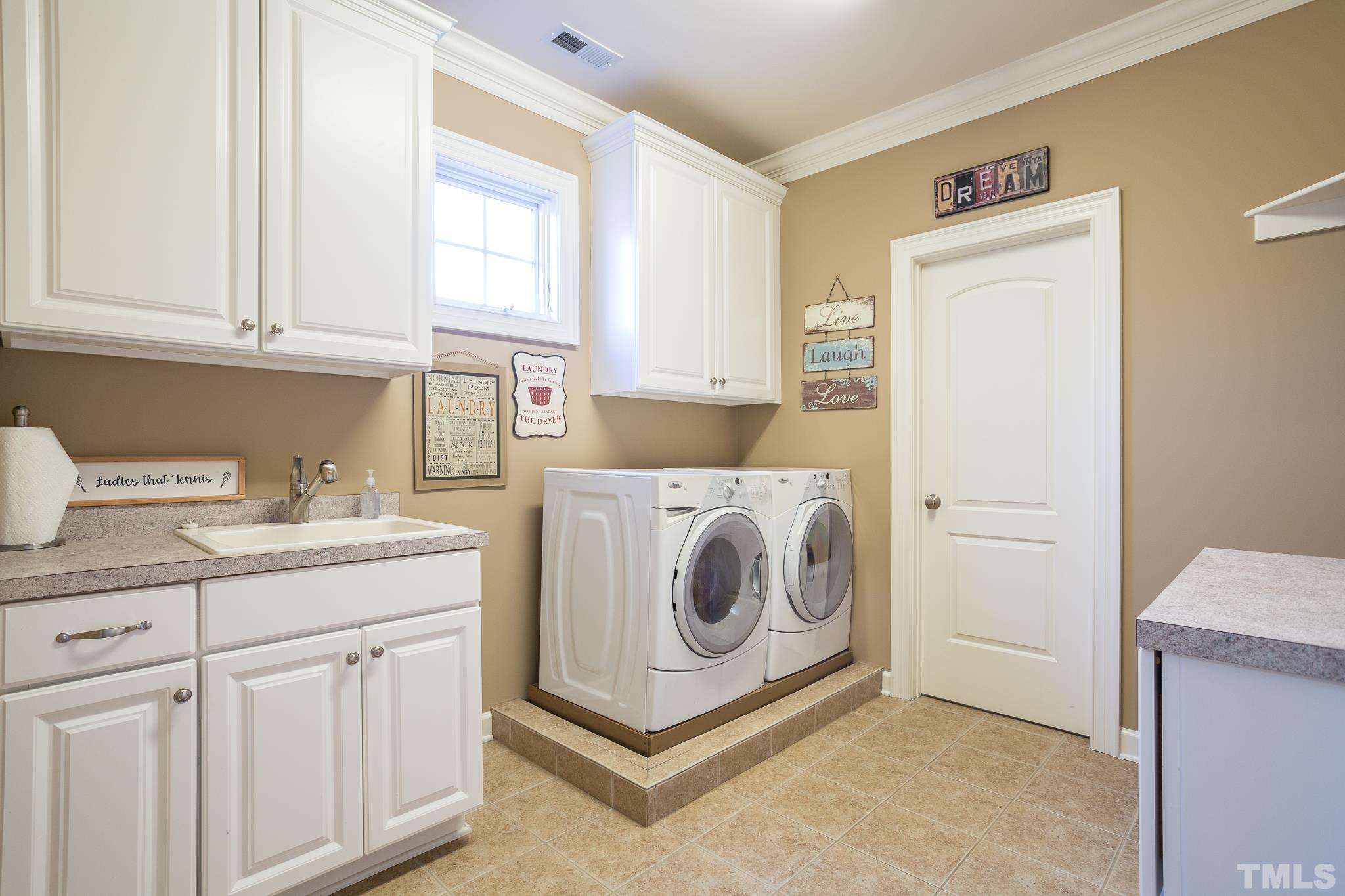 Laundry Room with Folding Table with Ample Storage