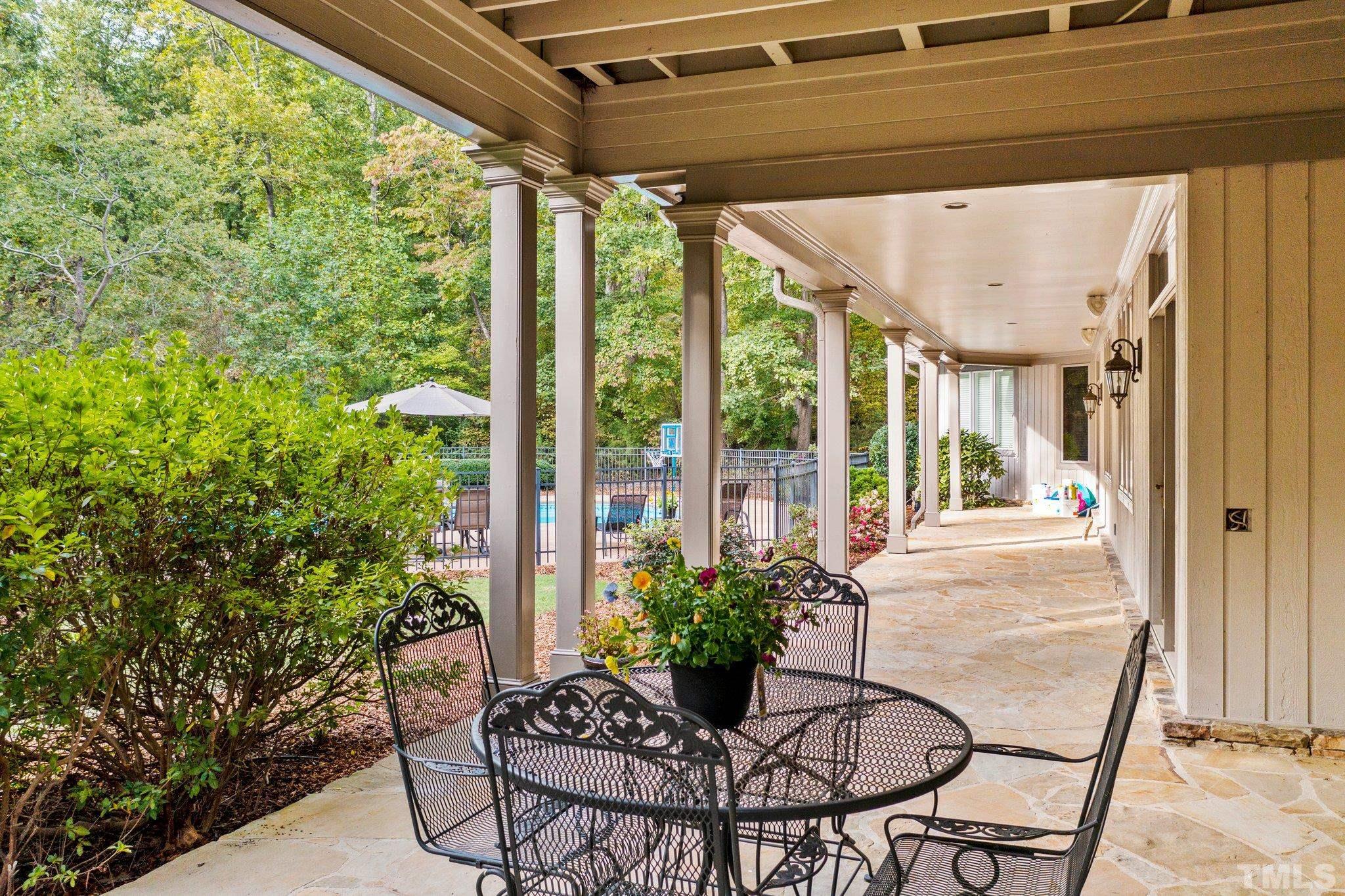 This beautiful porch runs along the whole back of the home and is a great space for entertaining! Lots of room for large gatherings