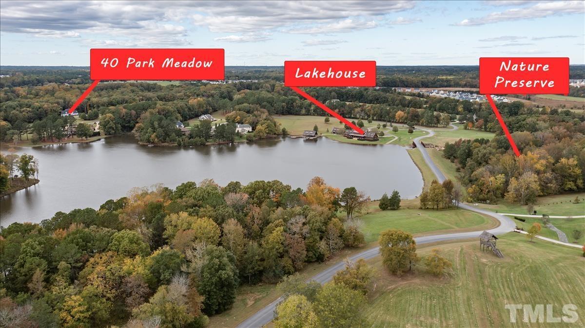 As you pass through the neighborhood gates and crest the hill, the view of the lake will take your breath away. It is a wonderful way to end your day and leave the world behind. Neighborhood has its own nature preserve and greenspace throughout
