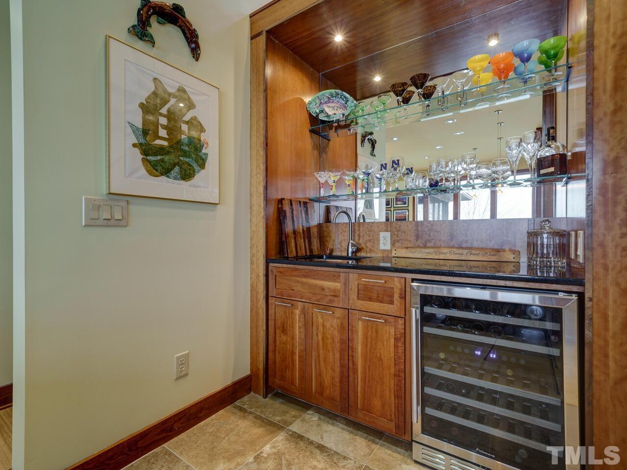 Wet Bar area with Wine Frig will come in handy for all of the entertaining that you are sure to do.