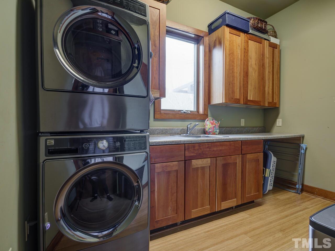 Laundry Room on the main level includes a sink