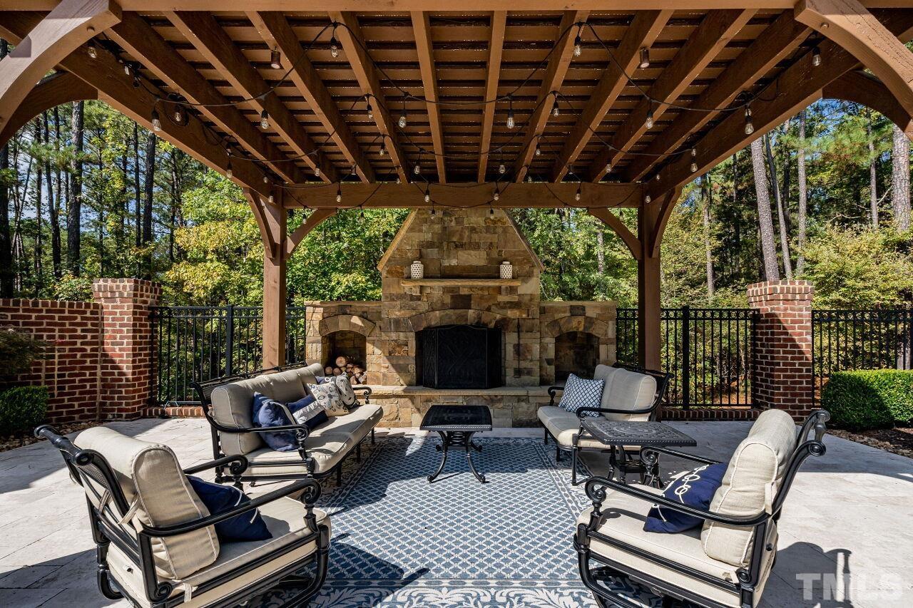 Spend cool summer nights outside around the stone fireplace.