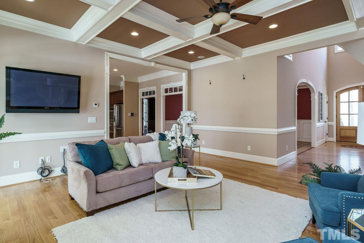 The family room has a neutral color.  How will you arrange your furniture?
