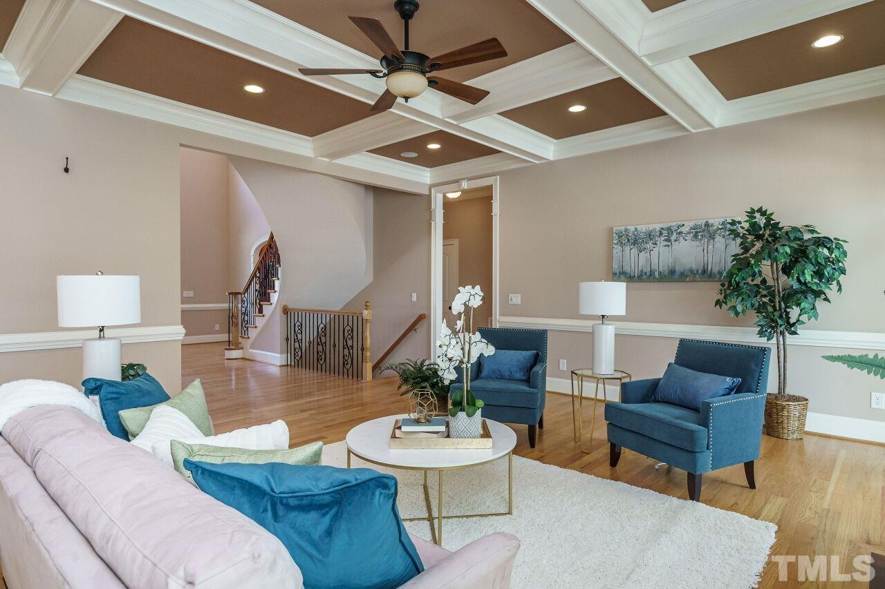 The family room has a neutral color.  How will you arrange your furniture?