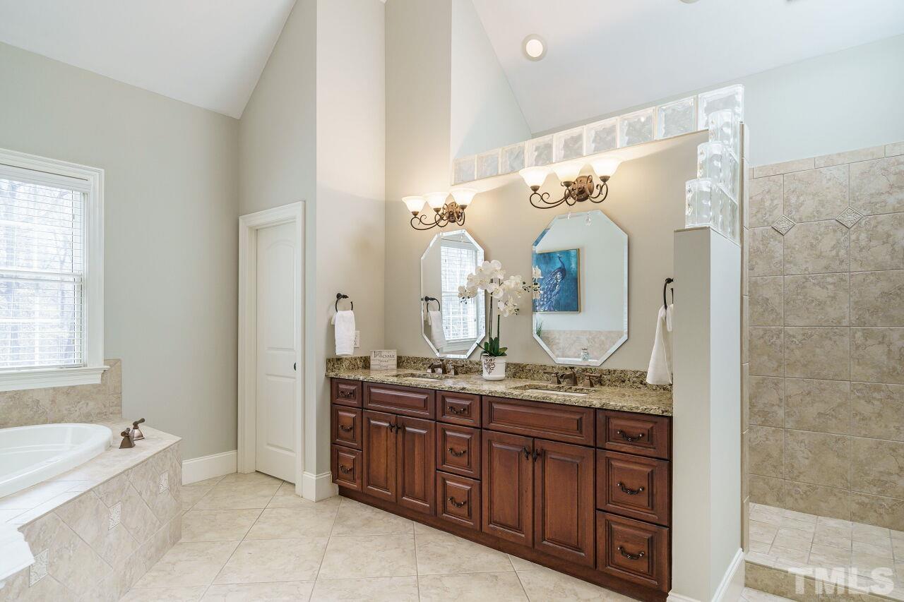 Welcome to your spa at home!  Enjoy a soak in the whirlpool tub at the end of the day.  The master bath also has a dual vanity with granite counters.
