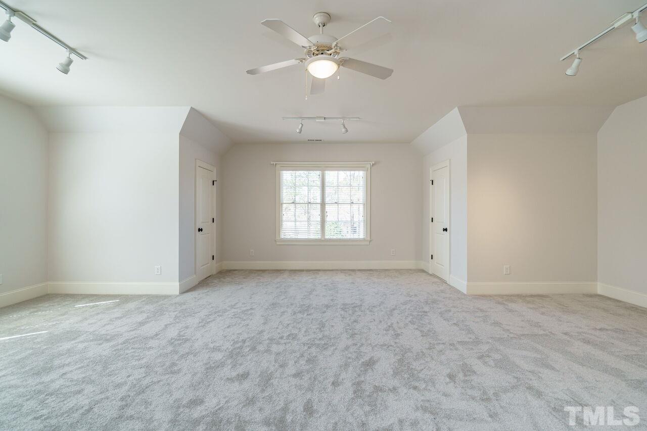 The bonus room has new carpeting and extensive storage is accessed through it.  What will you choose to use this space for?