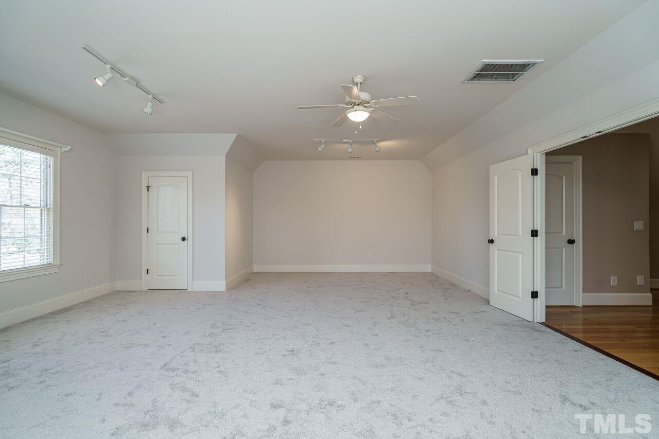 The bonus room has new carpeting and extensive storage is accessed through it.  What will you choose to use this space for?