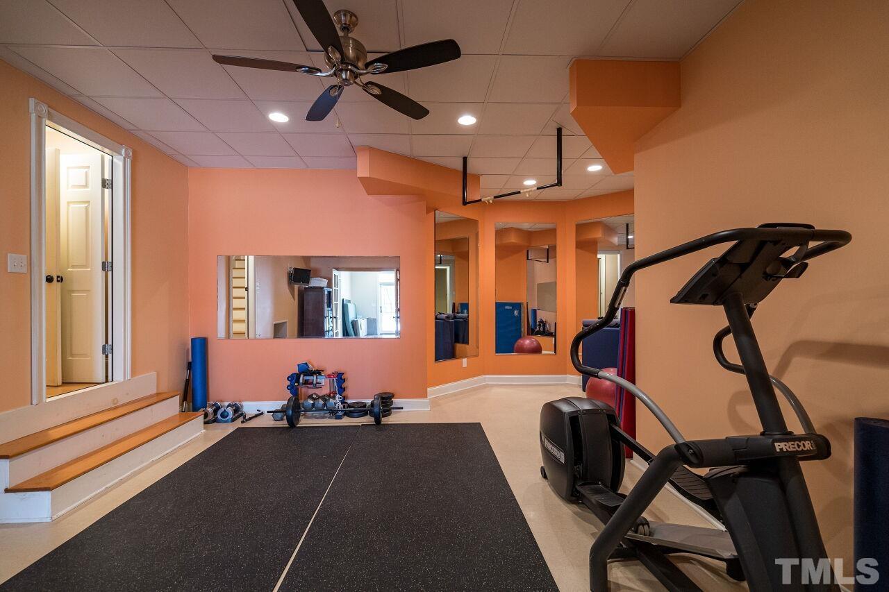 This fantastic home even has a fitness room.