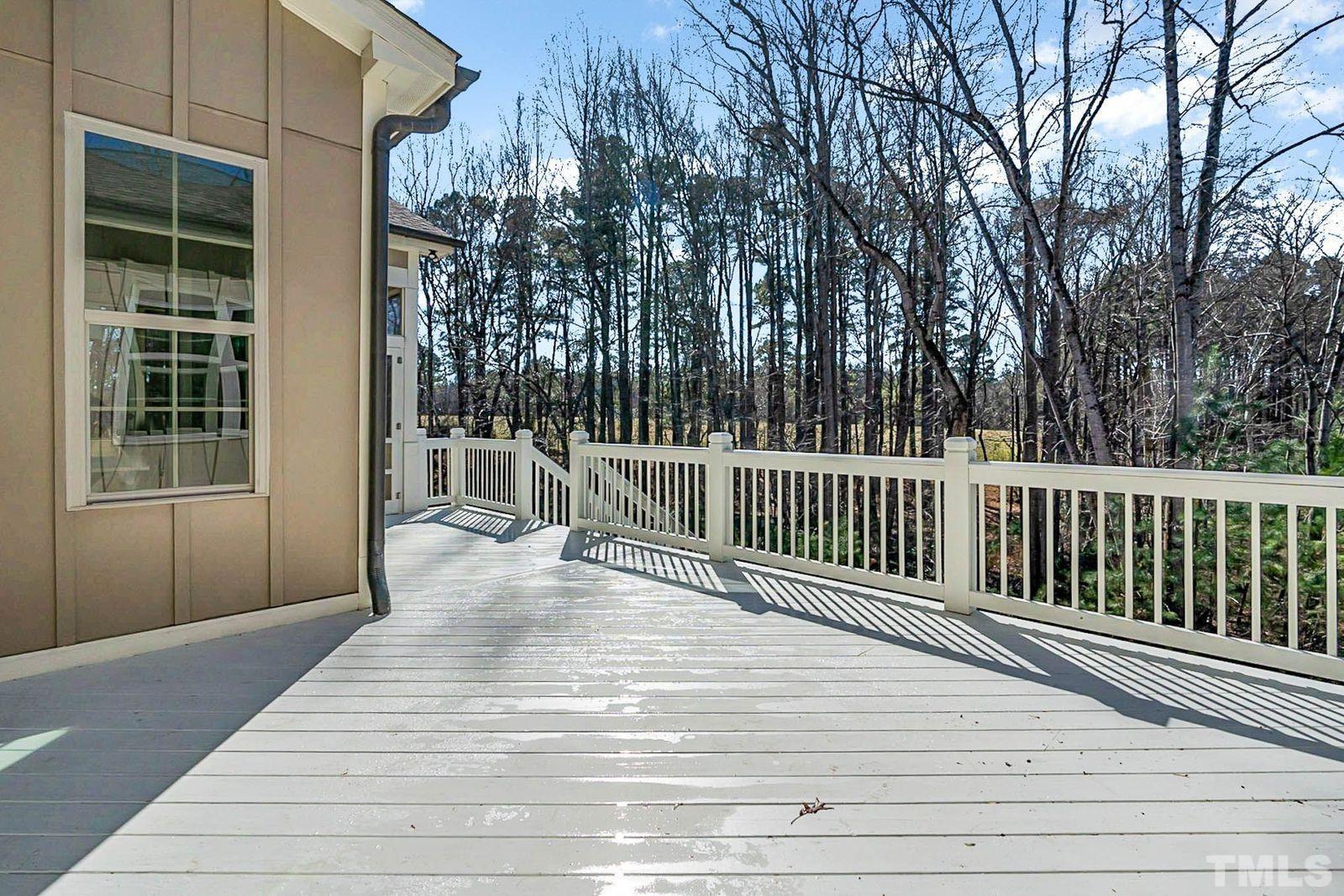 Spacious Deck With View OF Private Backyard
