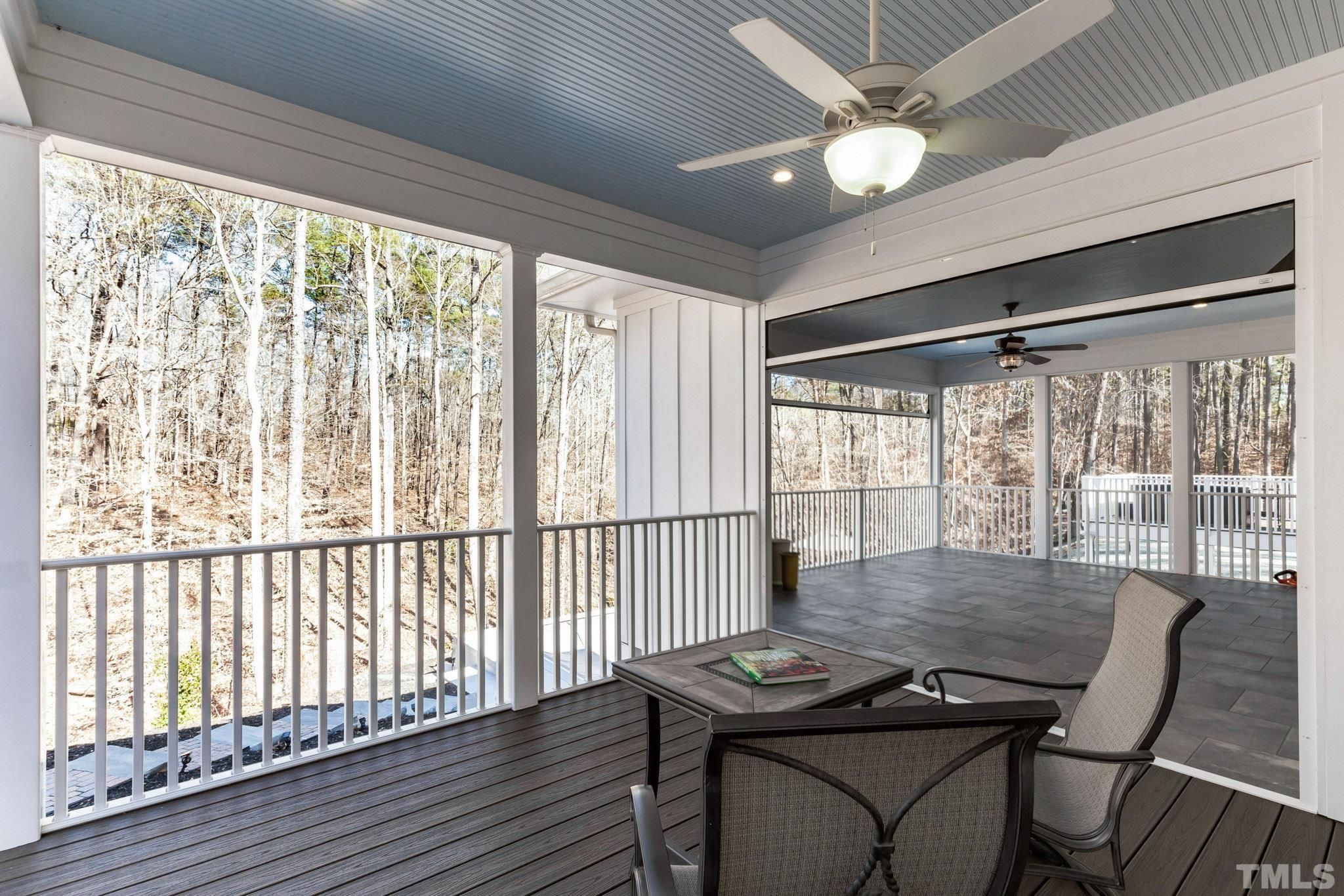 Open covered porch accessible from the screen in porch  and accessible from family and dining rooms.