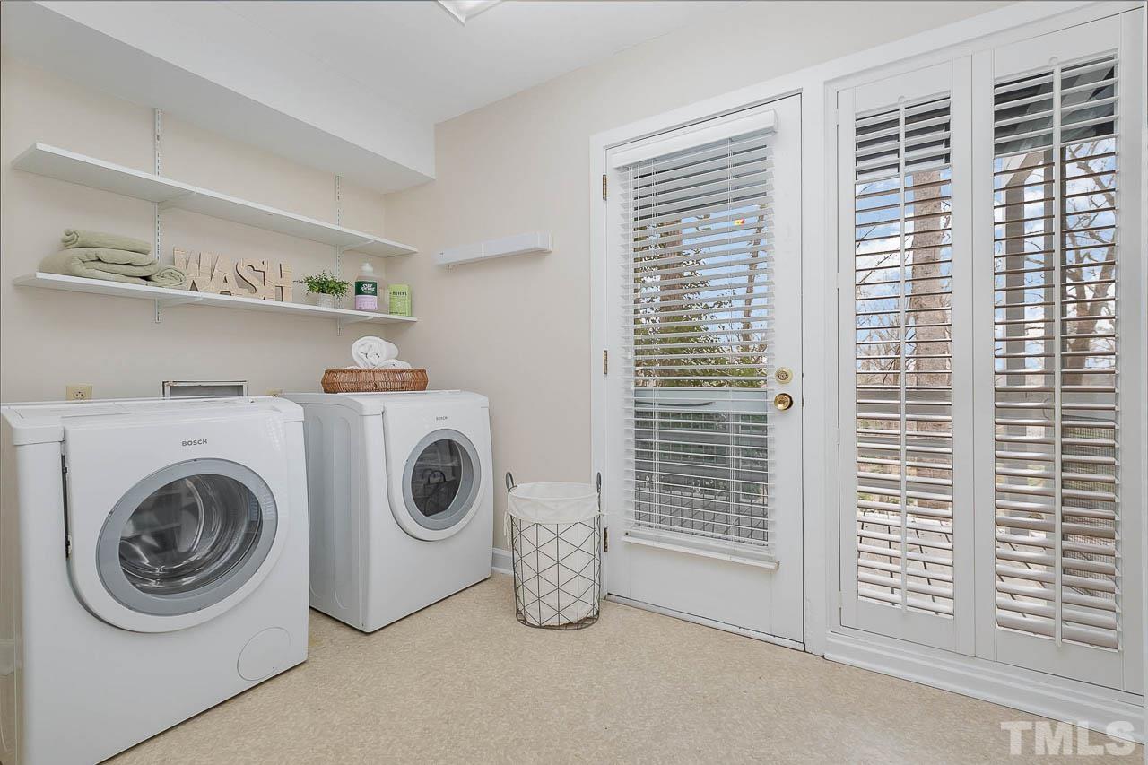 Spacious Laundry Room w/Storage and Light Plus  Door to Deck!