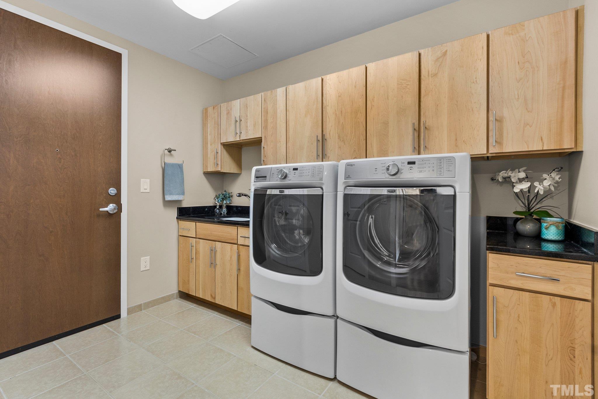 Laundry Rm with custom cabinetry