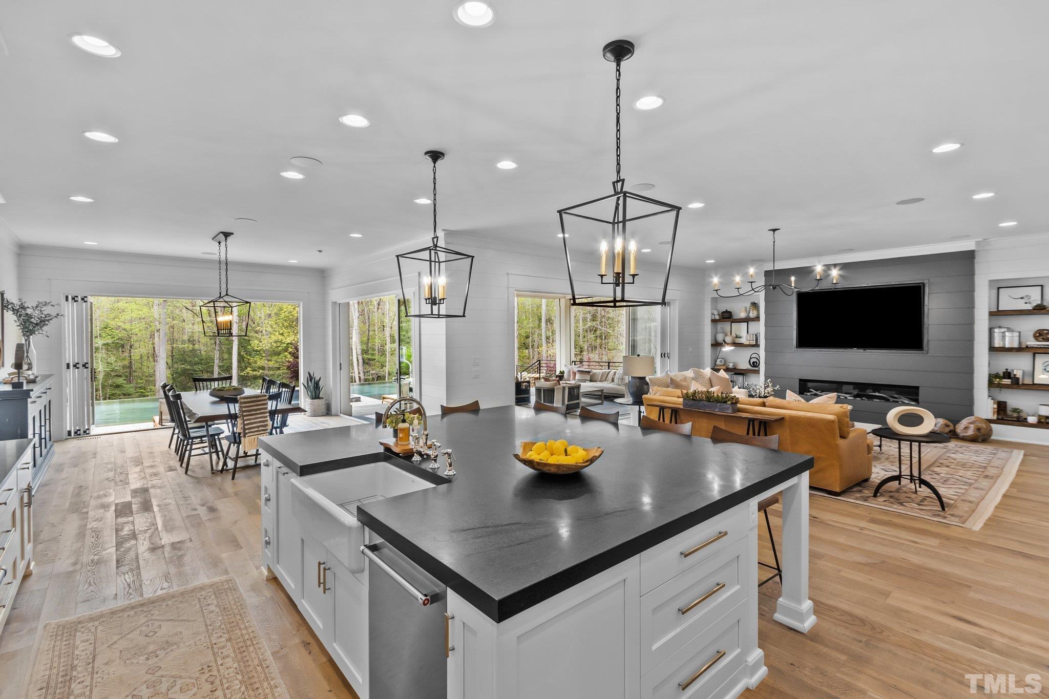 The Chef can be participate with friends and family as they gather in the kitchen, dining room, family room and screened porch as a result of the design of this one of a kind home.
