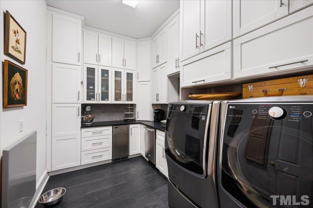 Wow.. just wow!  Immense -Newly renovated - right off mudroom -slate tile floors, fresh white cabinetry floor to ceiling for all of your china and large appliance storage. Complete with Perlick icemaker, Electrolux dishwasher & folding table.