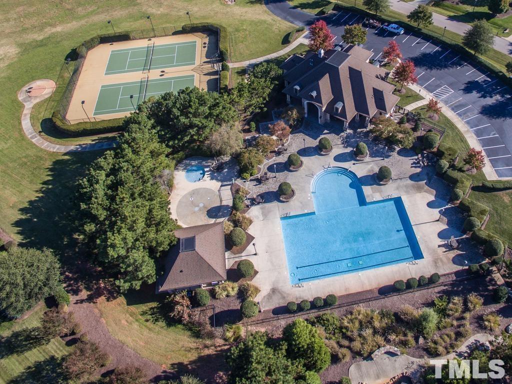 Highly sought after, The Registry Community offers beautiful high-end amenities with an amazing pool w/waterfall, tennis courts, incredible clubhouse, exercise room & water park.