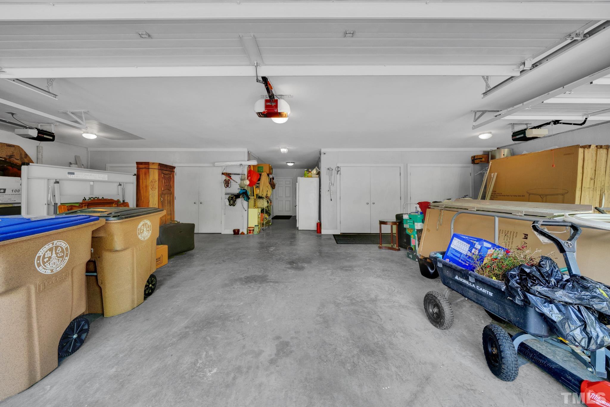 4 CAR GARAGE WITH LOTS OF STORAGE