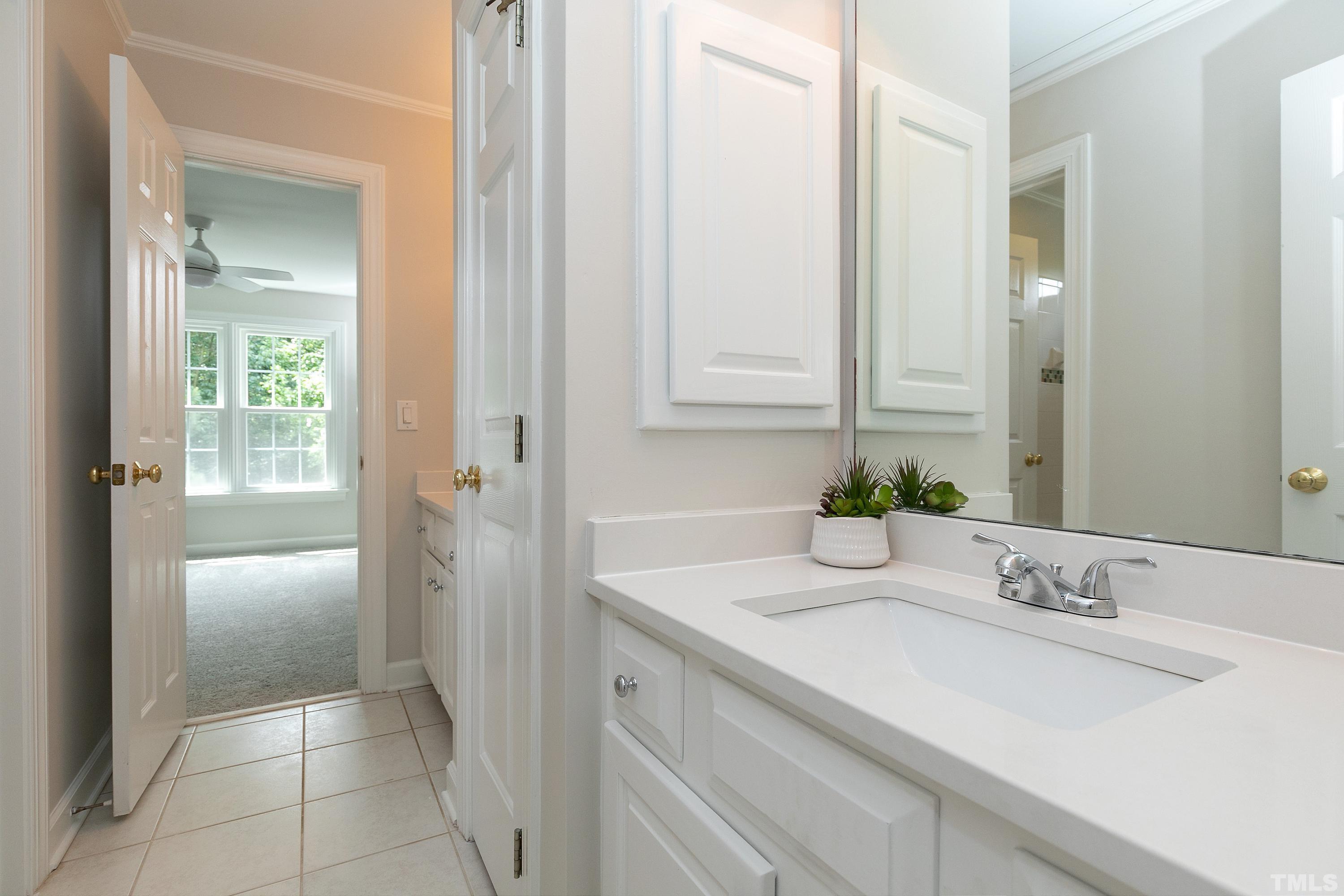 ack & Jill Bath connects to 2 bedrooms with separate vanities and a separate shower room. Vanity with new QUARTZ top.