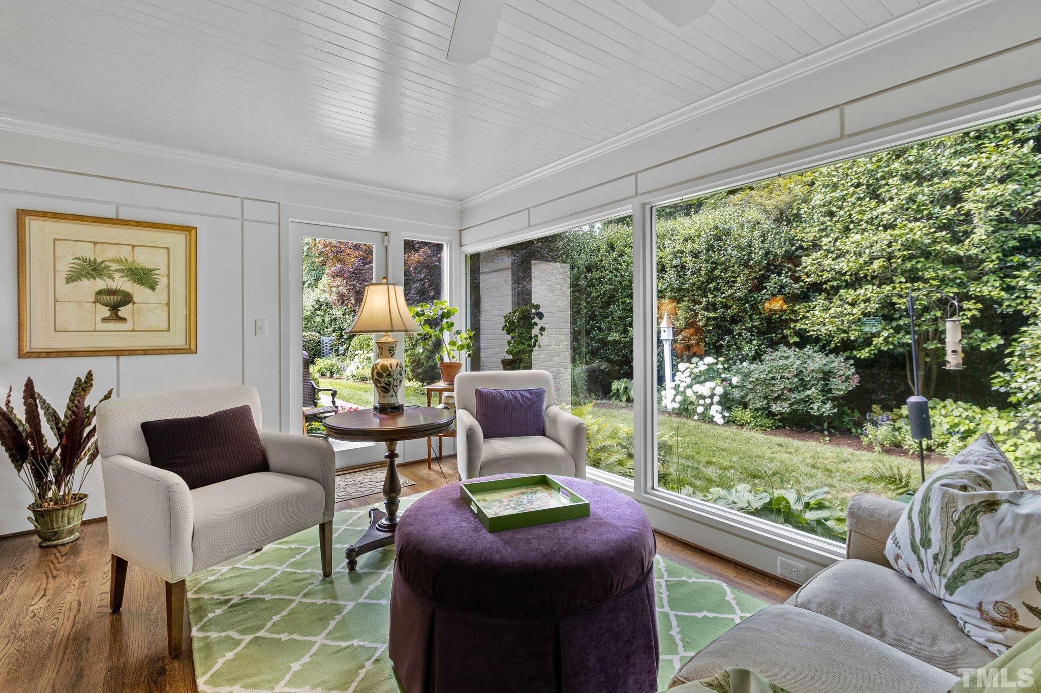 Breath taking views from the sunroom, filled with full windows allowing natural light and overlooking the impressive plantings and mature hedges that cannot be reporduced in our lifetime.