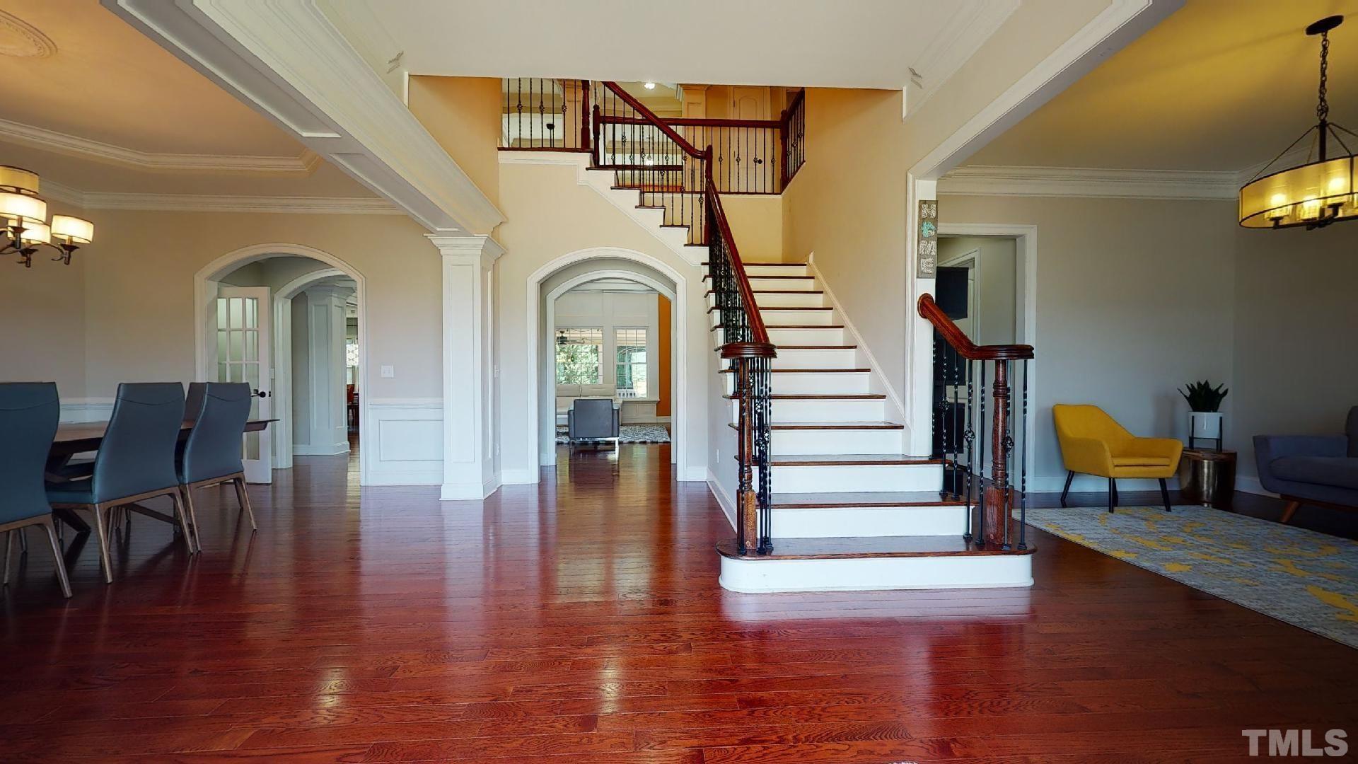 A welcoming and expansive elegant foyer