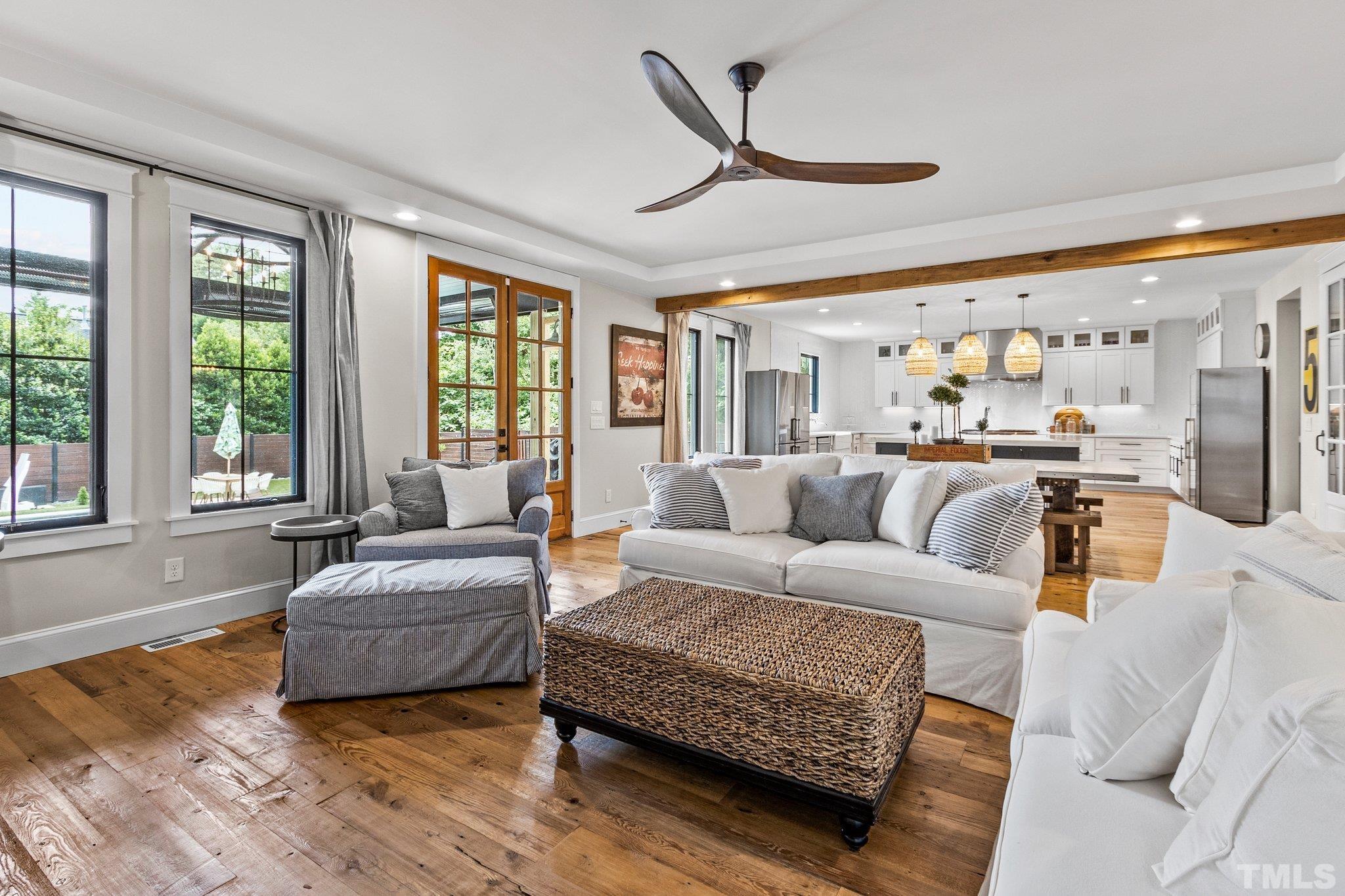 Enormous family room, open to the kitchen, with easy step-out to the covered porch. Enjoy a whole-house breeze with the Marvin casement windows throughout the first floor.