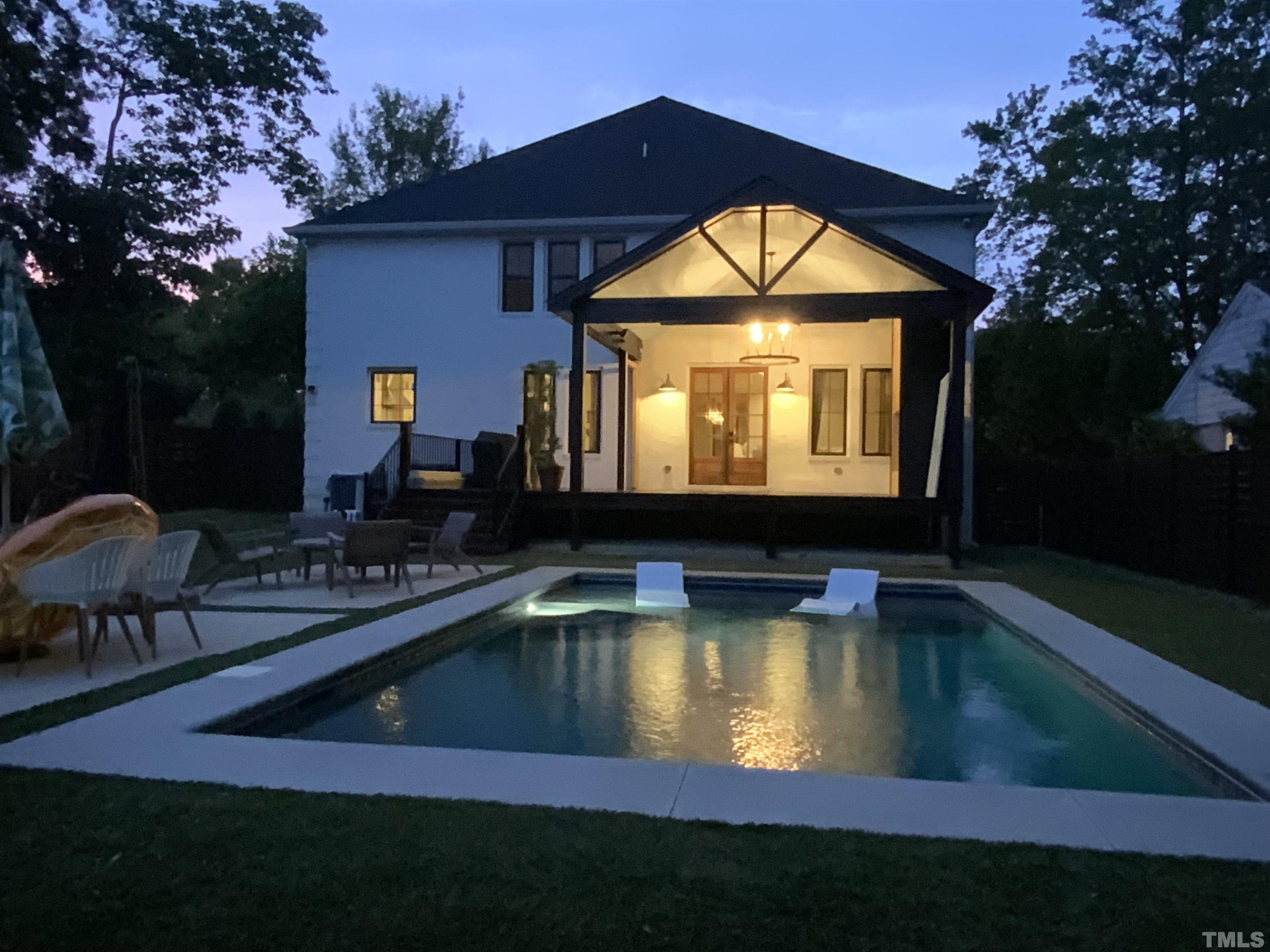 Covered rear porch with seamless metal roof, internet, media & audio hardwire and custom Bahama shutters. Perfectly comfortable year-round with two electric Bromire heaters.