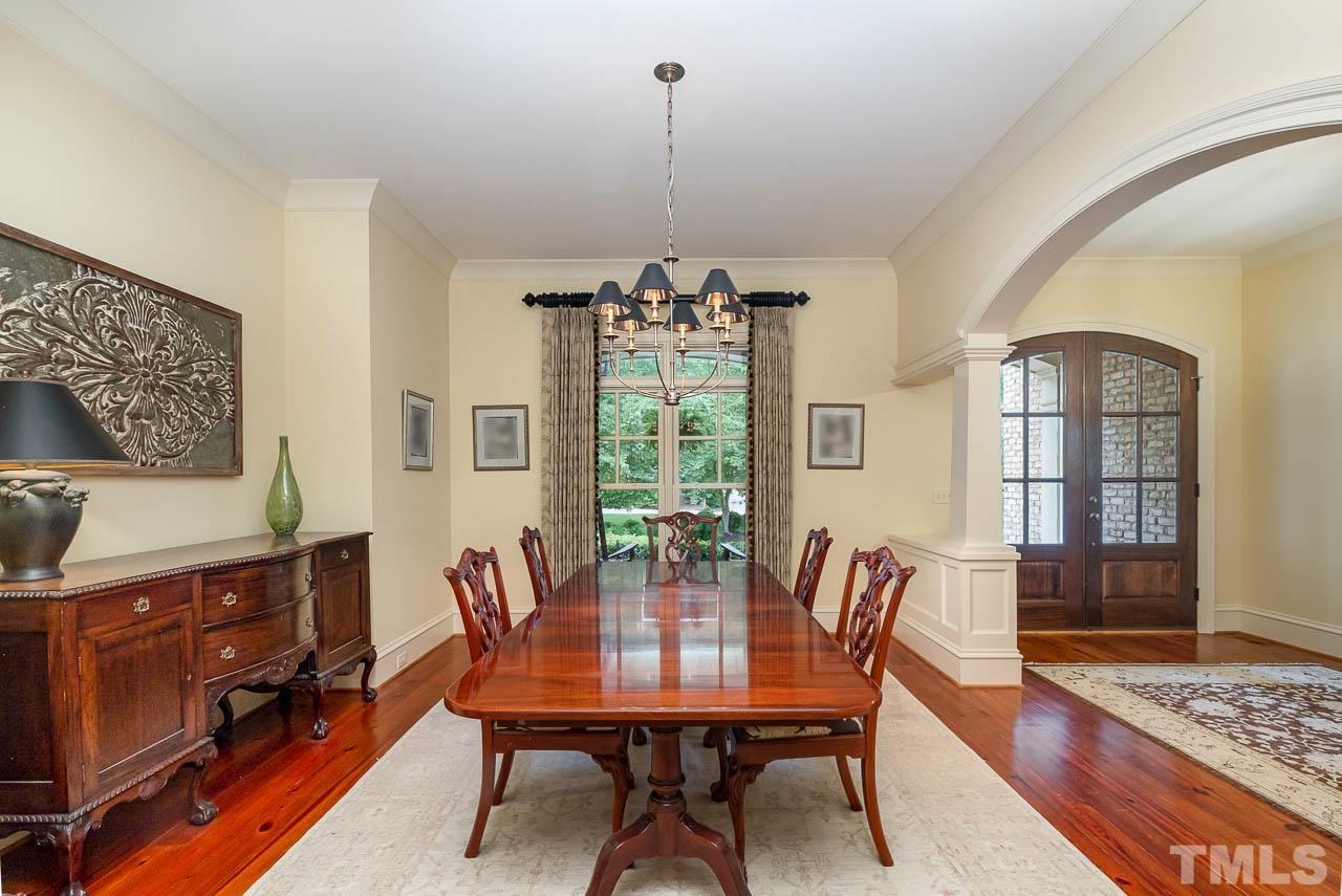 Enter the lovely arched doorways into the spacious open concept dining area.  Open flow for entertaining.
