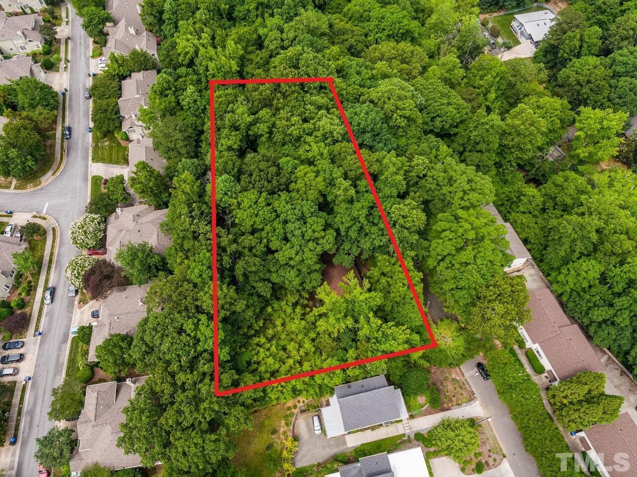 Rare development opportunity this close to downtown and UNC! 1.18 acres at the end of a quiet street waiting to be utilized! Develop into small lots or multifamily. Price points for neighboring detached homes in the mid $5 and $600's. Adjacent duplex homes sell in the mid $3 and $400's per unit. The town says build a turn around to make multiple lots and do what you want. Setting and location are unsurpassed. A canvas waiting to be built! The existing home is solid and livable with pretty views as-is, needs updating.