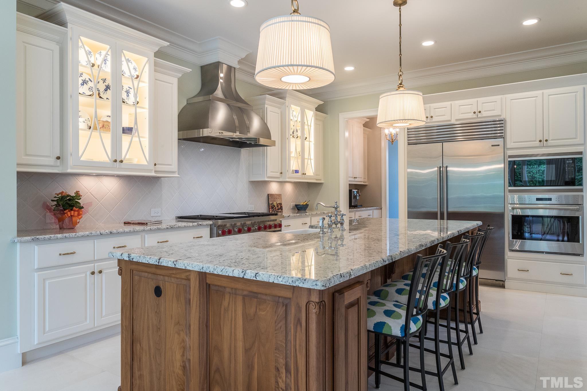 Enjoy a casual brunch or catch up with friends and family over hors d'oeuvres at your beautiful kitchen island